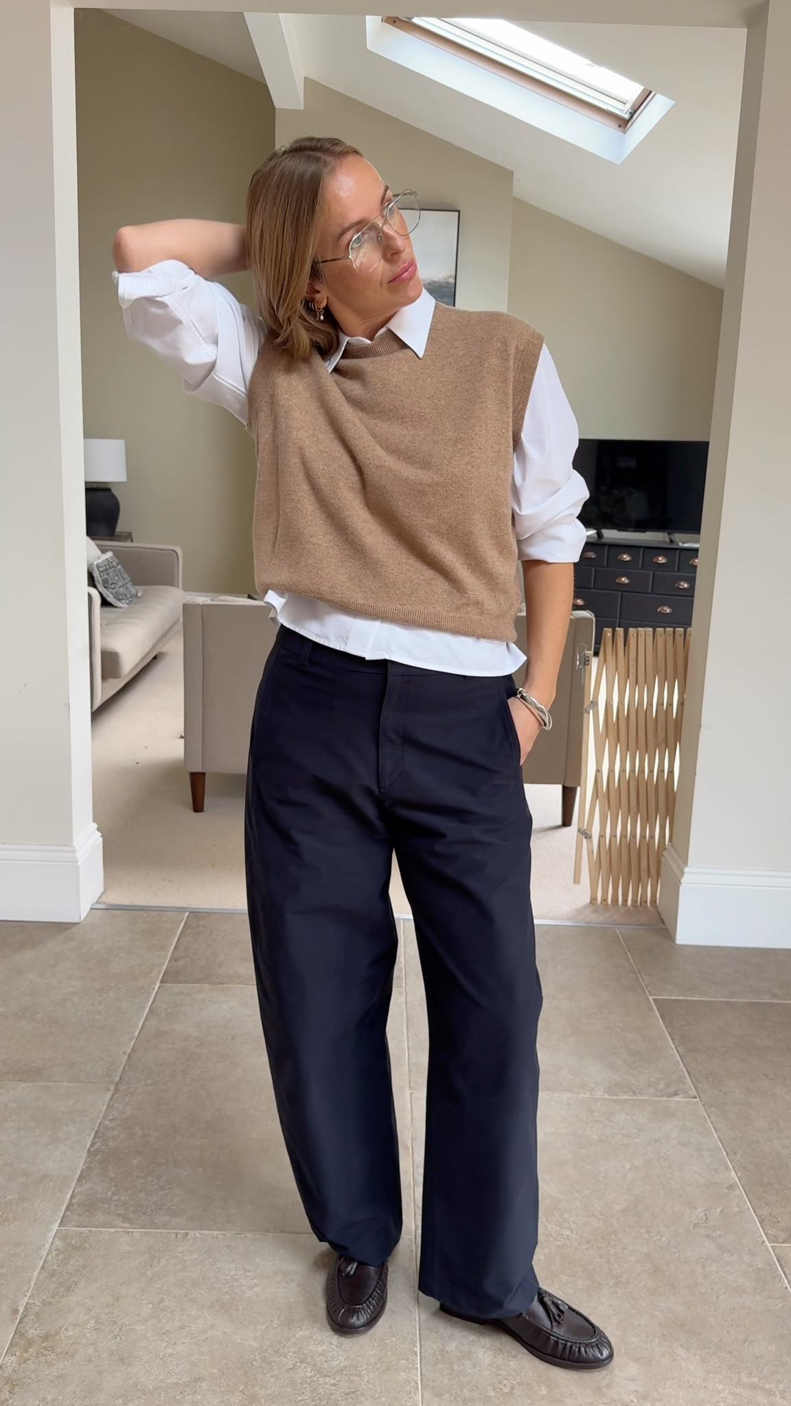 It’s my job to show you the versatility hiding in your wardrobe 😉
This cashmere tank is the perfect layering piece. 
Styled over that must-have shirt I’m always talking about, it’s effortless, elevated, and ideal for cooler days.
When the temperature drops, I’d simply add a thermal underneath for extra warmth without losing the look.

Cashmere tank - medium 
Shirt - medium 
Trousers - large regular length  
Trench - wearing a medium ( I’d prefer the large ) 

#LTKwinter #LTKworkwear #LTKautumn