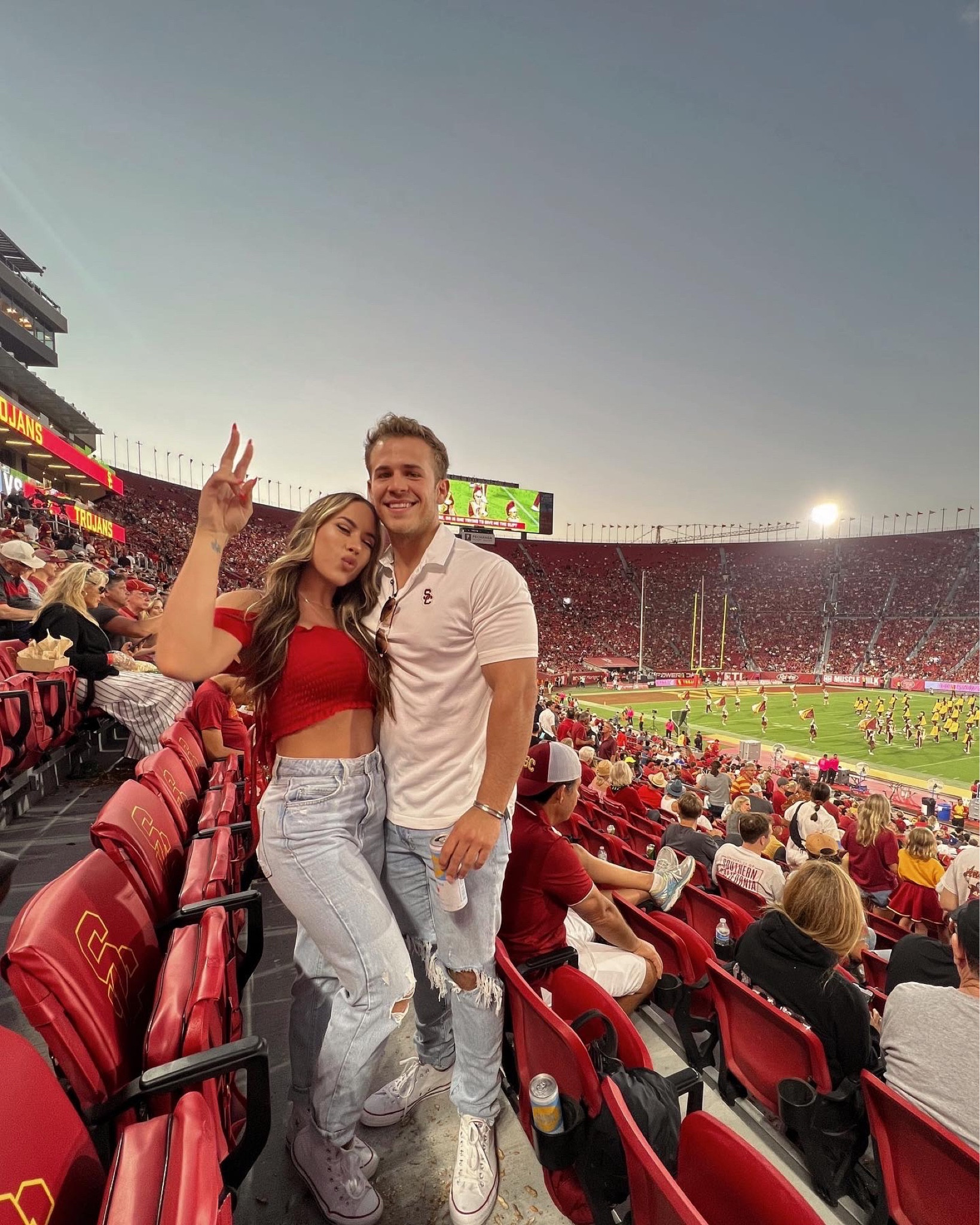 Couple Game Day outfit 

#football #couple #white #red #jeans #outfit #rippedjeans #matching #croptop #converse 

#LTKSeasonal #LTKfit #LTKmens