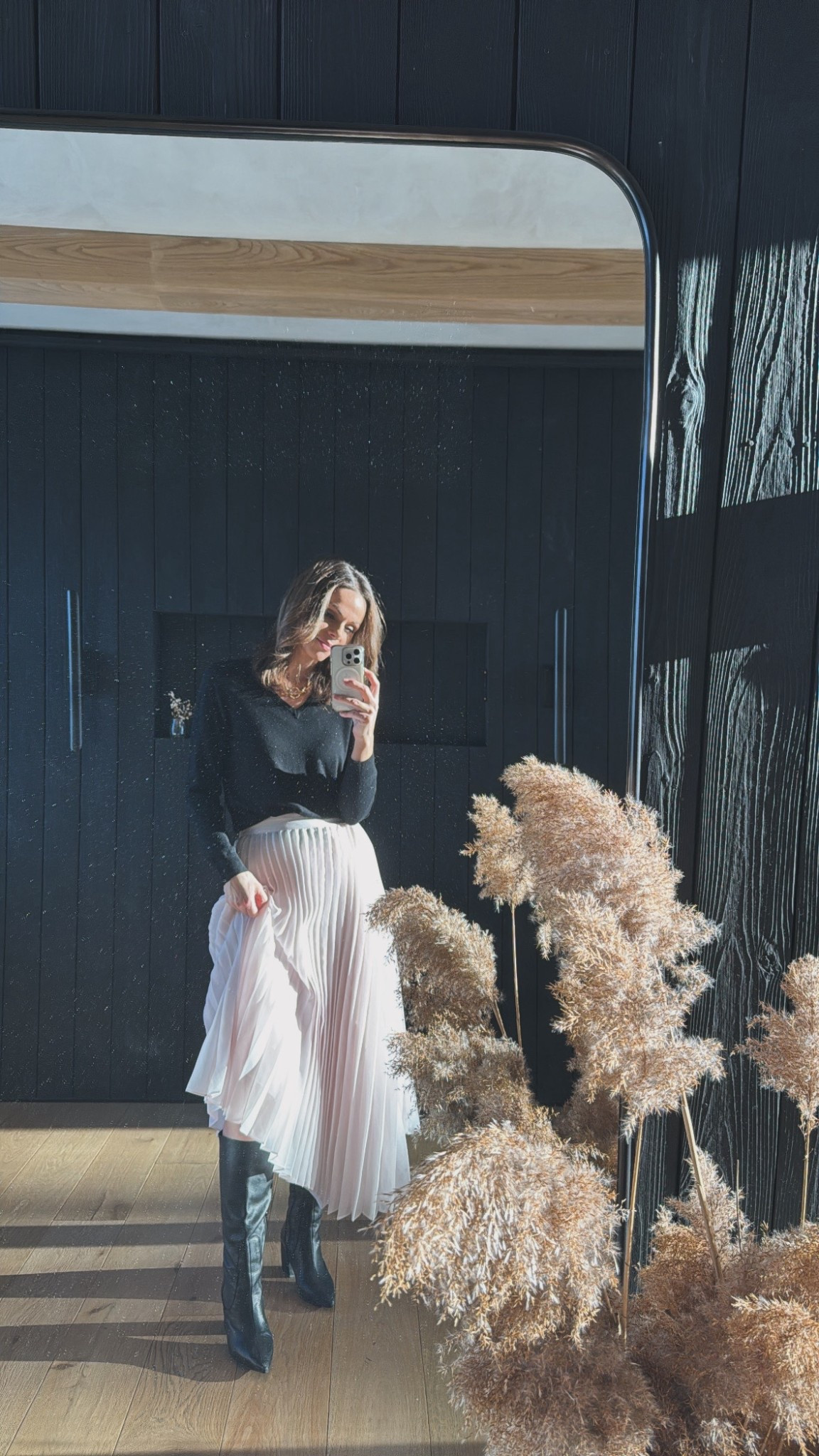 Golden Hour ☀️

Pleated skirt 
Flirty blush outfit 
Classic black boots 

#LTKOver40 #LTKootd