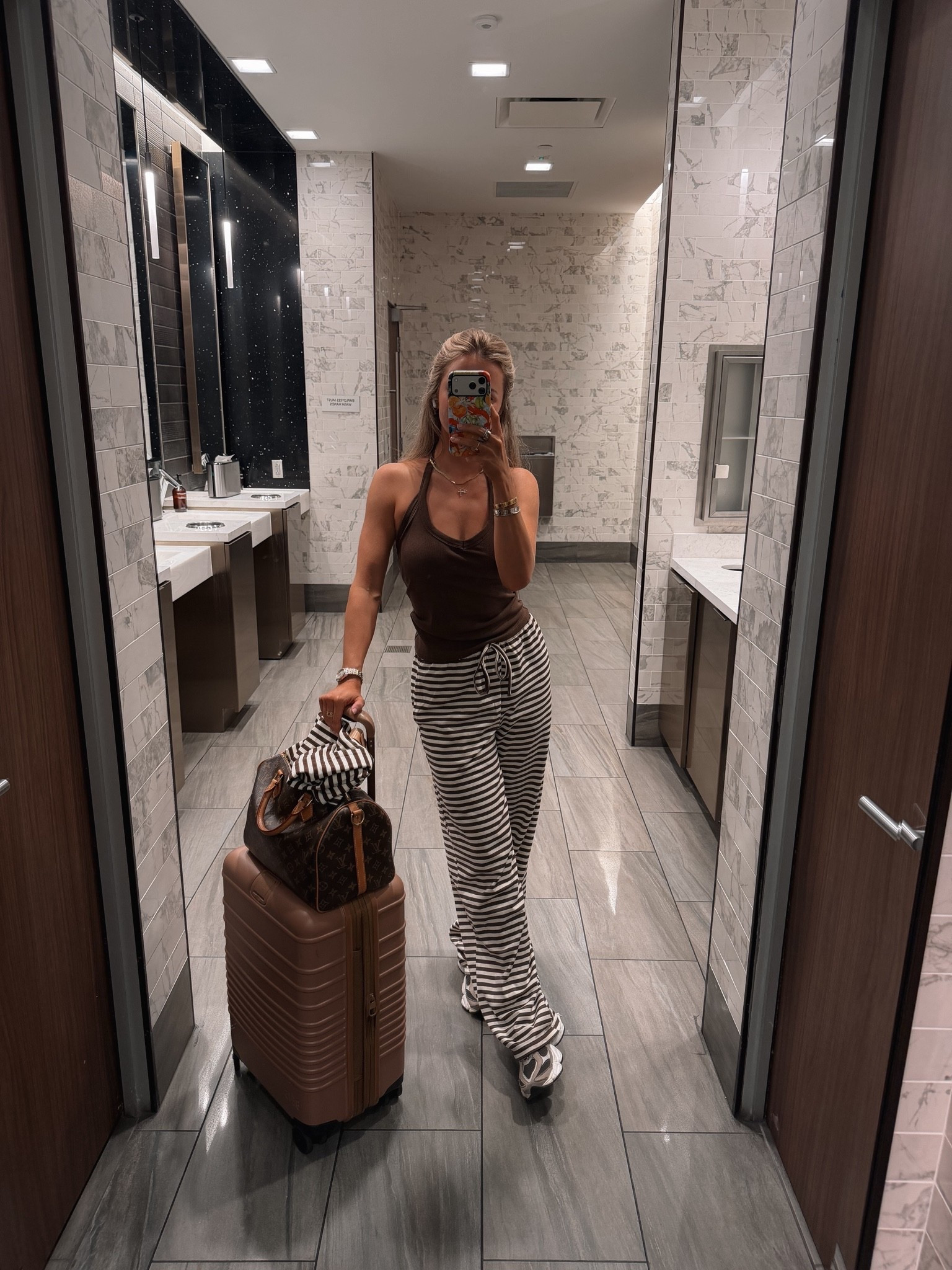 cutest revolve travel set!! wearing xs!

#LTKmorningroutine #LTKootd #LTKTravel