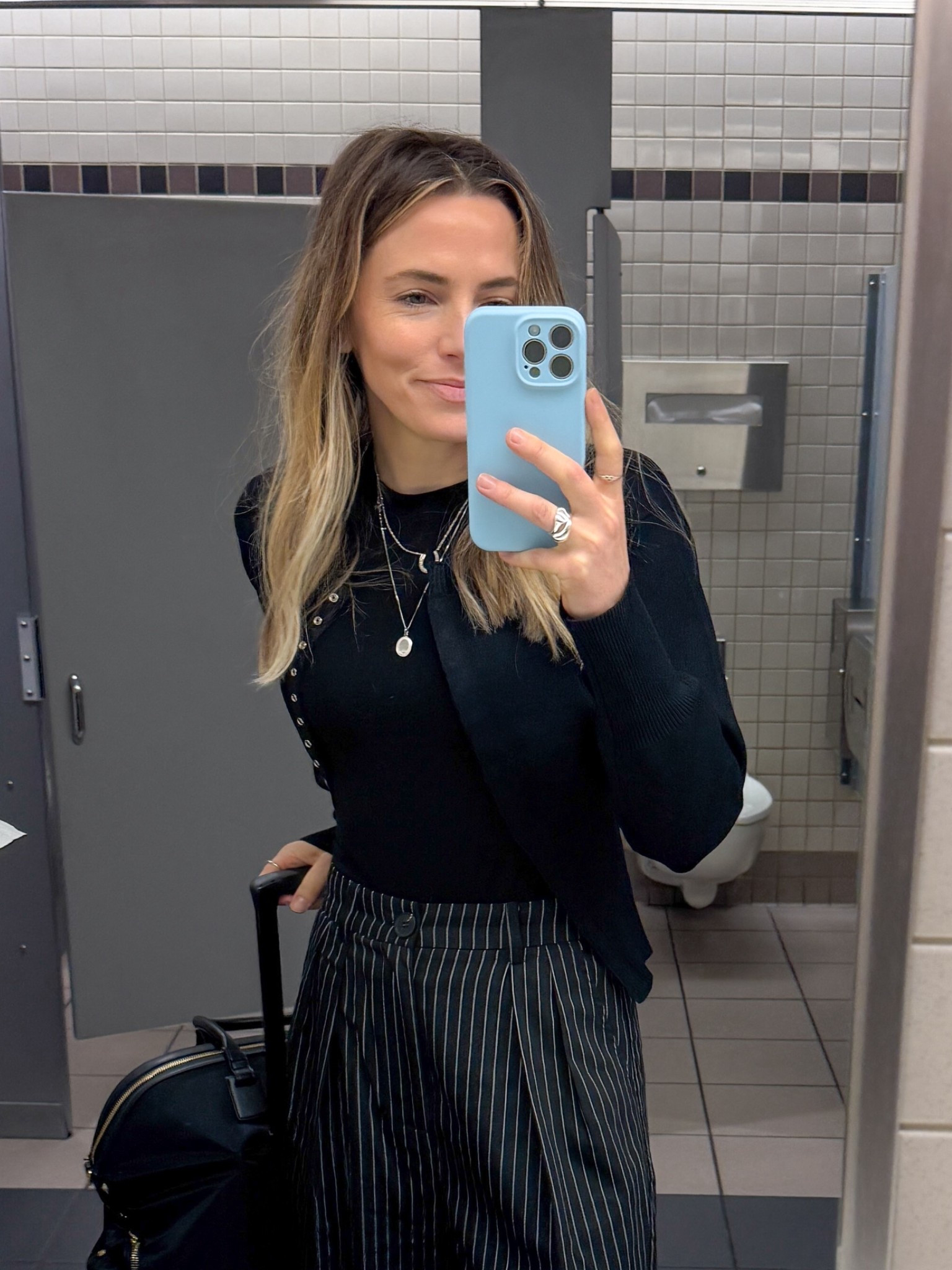 travel day, but making it corporate girlie chic ✈️ i wore this outfit flying up to Newark & straight into a  meeting at the the Newark hangar. These pinstripe pants are perfect for travel days- they’re polished enough for work meetings but comfortable enough for a flight (a travel win). I styled them with with a lightweight layering tee & knit cardigan for that easy, elevated look.
	•I’m wearing a size small in the sweater, tee & pants
	•Pants have stretch + structure, making them great for travel days
	•Cardigan layers easily over a tee or blouse
	•Outfit transitions seamlessly from airport to meeting room
Linked the full look here so you can shop it 🤍
#traveloutfit #airportstyle #airplaneoutfit #officeoutfit #corporatoutfit


#LTKStyleTip #LTKWorkwear #LTKTravel