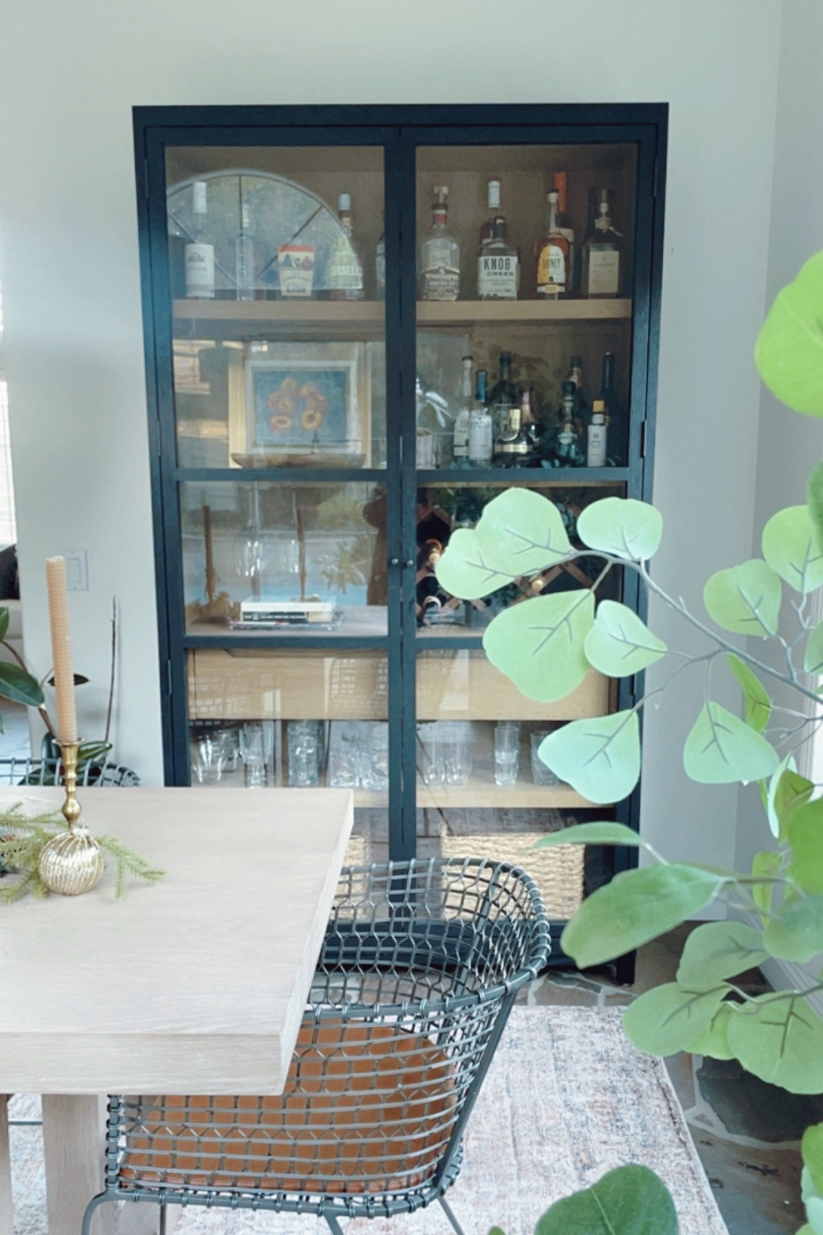 Still love this black curio cabinet with glass doors and natural wood interior! 😍

#LTKStyleTip #LTKHome #LTKSaleAlert