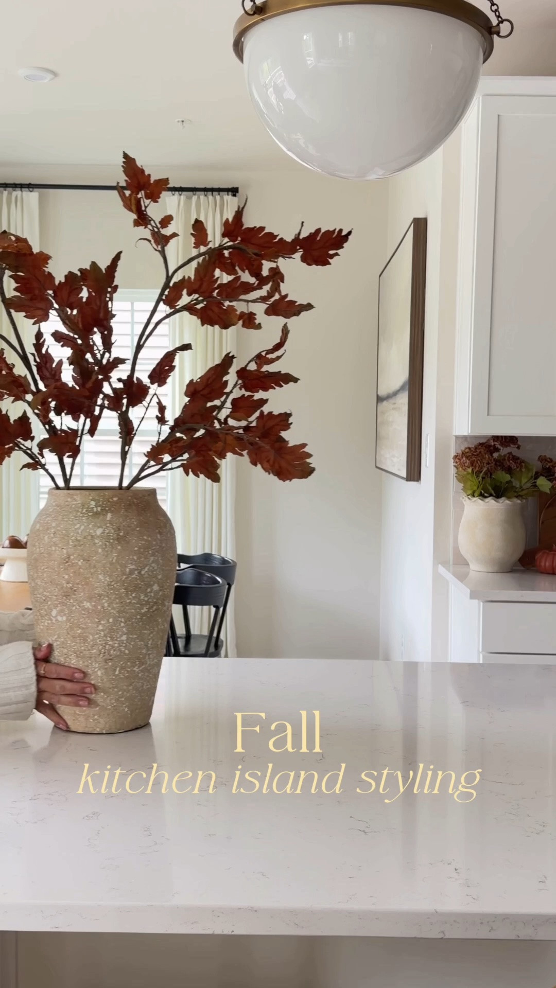 Fall kitchen island styling 🍂
Adding a few warm, seasonal touches to make the heart of our home feel cozy for fall. 🤎 I love keeping seasonal styling simple and letting a few beautiful details make the difference.

Save for fall kitchen inspiration ✨

#falldecor #fallinspo #kitchenislanddecor #fallkitchendecor #vase #fallstems #whitekitchen #homedecor #fallcandle #woodriser #pumpkins

#LTKHome #LTKSaleAlert #LTKSeasonal
