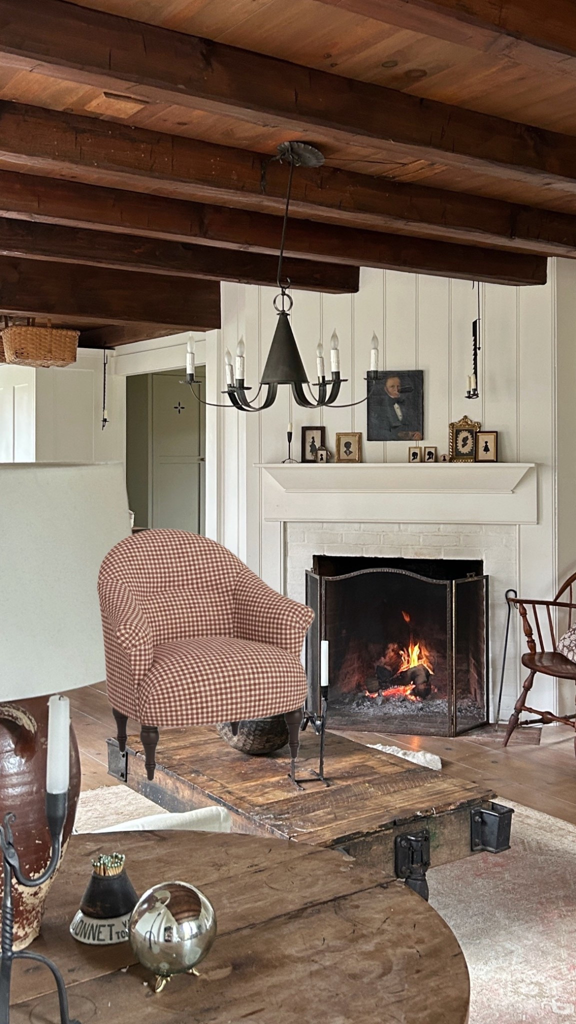 Contemplating a new chair by the fireplace...