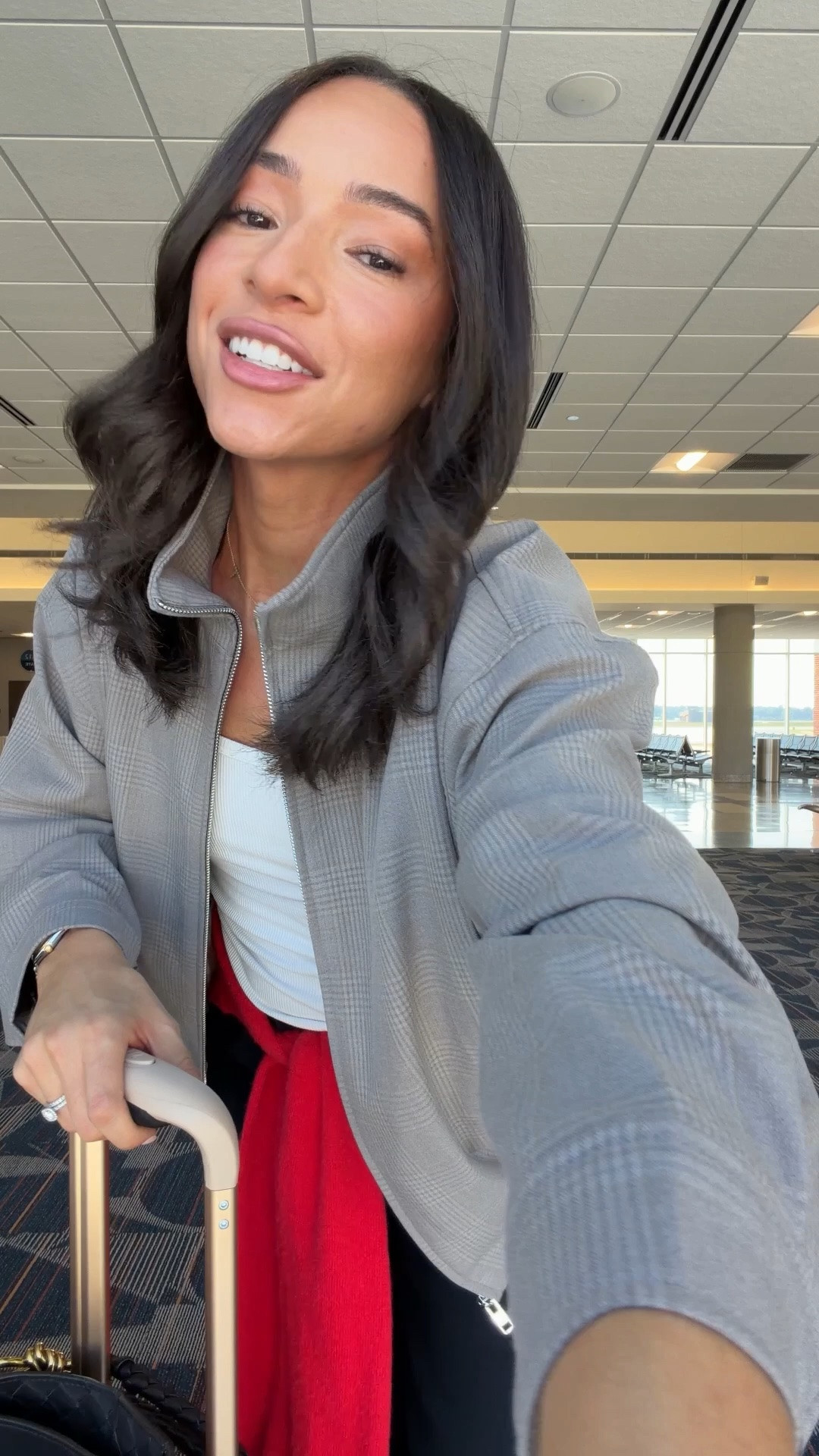 Airport outfit ✈️ comfy and chic for a travel day that needed to work for lunch upon landing. Wearing a size S in the viral pants that don’t wrinkle, S in funnel neck jacket, and S in tank and cardigan!

#LTKTravel #LTKootd