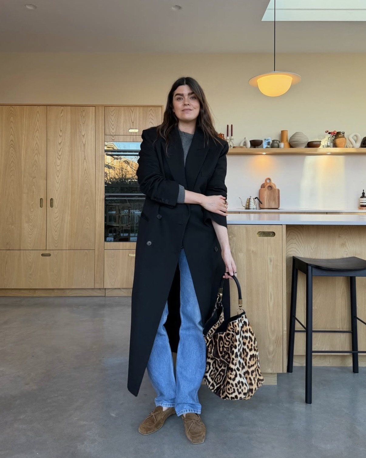 Elevating a black coat and jeans with a pop of leopard print, vintage YSL bag, similar linked 

#LTKstyletip #LTKwinter