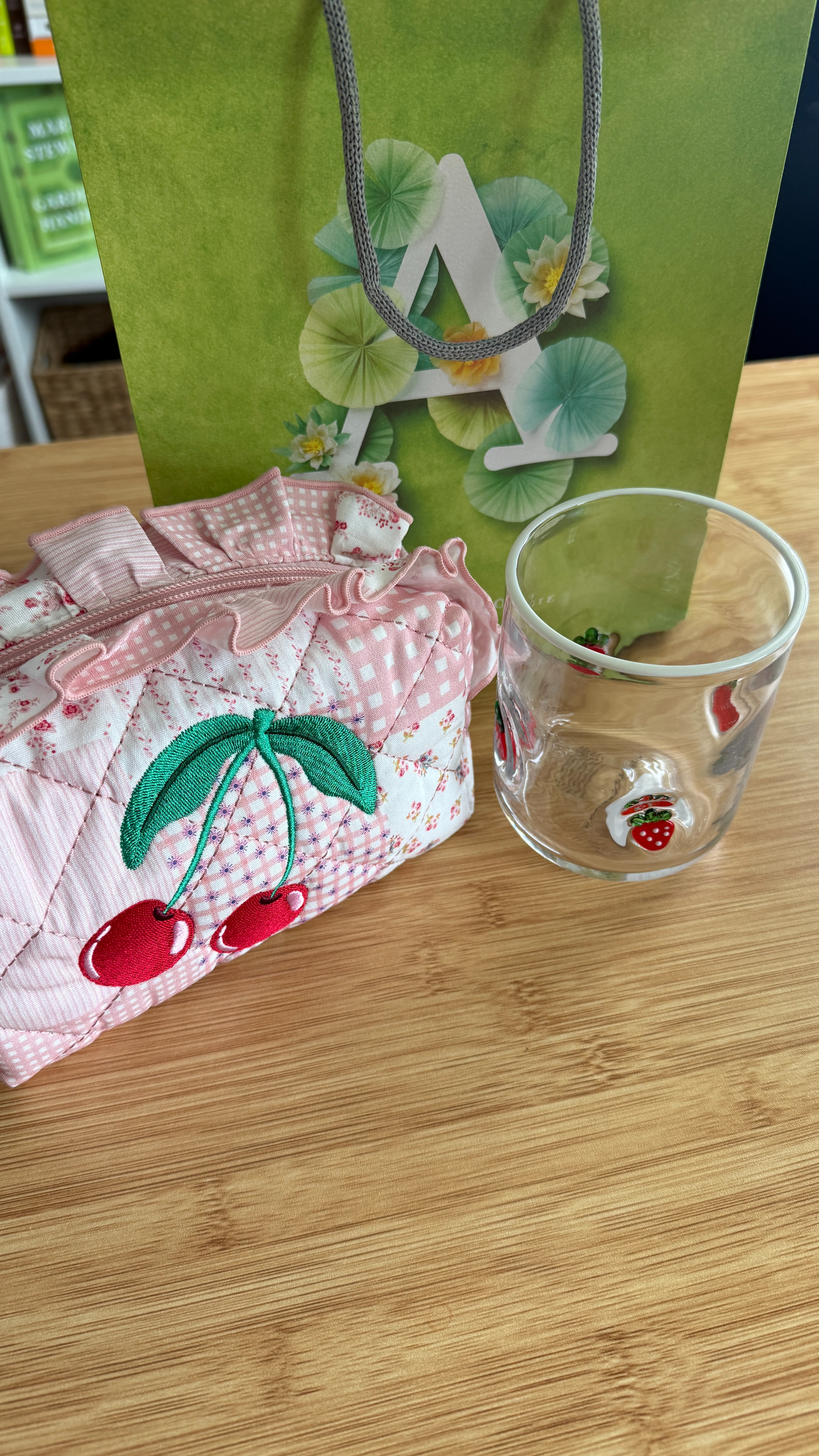 I’m obsessed with 🍒💗 The Anthropologie Shiraleah Quilted Cherry Cosmetic Bag is simply sweet with its girly pinks and reds, patchwork accents, and embroidered cherry. Paired with the cutest icon juice glass with strawberries, it’s giving playful, feminine charm — perfect for everyday use or gifting 🤍 

 #LTKfitnessgoals #LTKmorningroutine #LTKselfcare