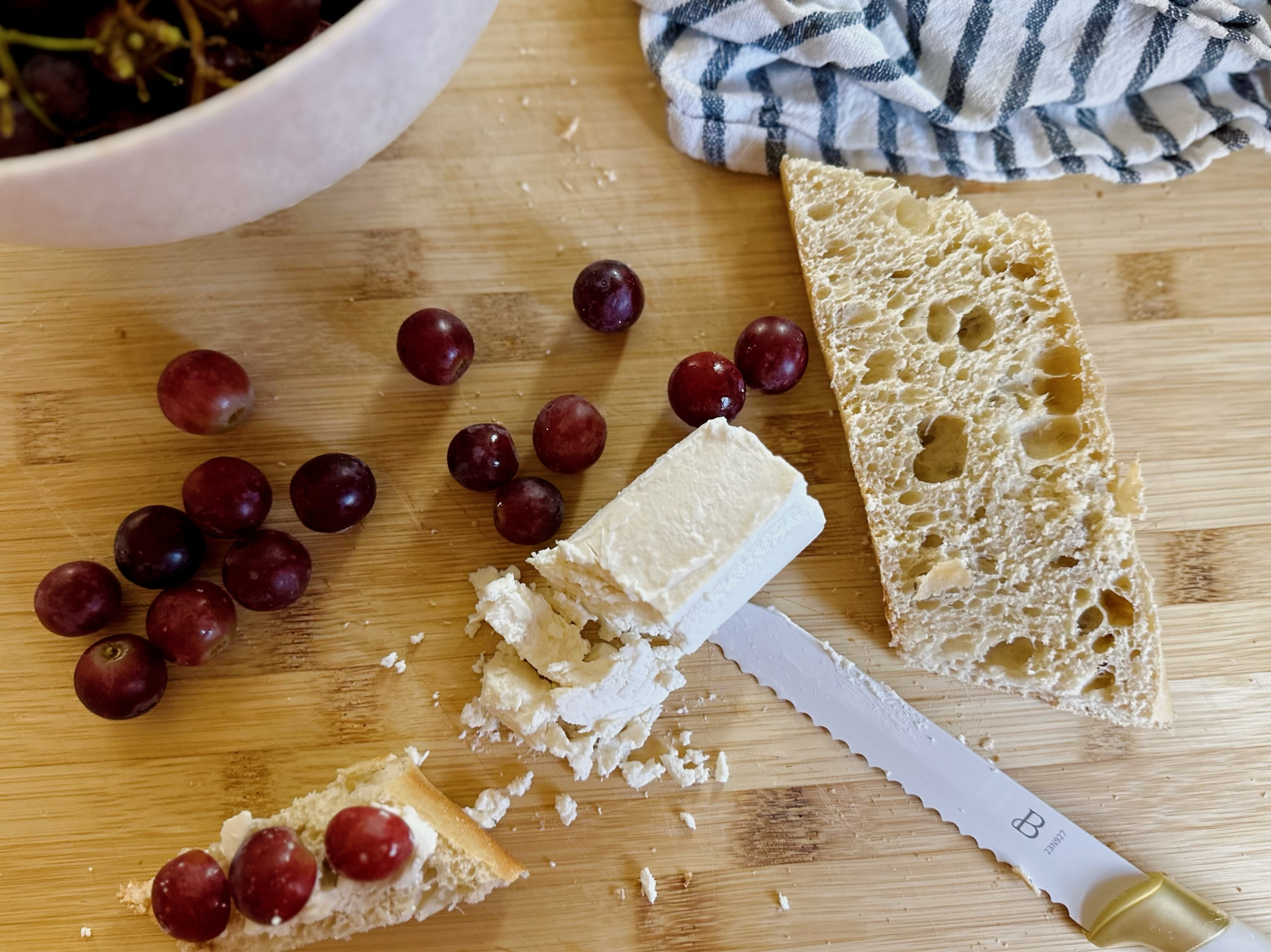 My current go-to snack is so simple. Fresh toasted baguette, a smear of tangy honey goat cheese and sweet sliced red grapes. The perfect way to slice all of this- with my knife set from @Walmart. #WalmartHome #WalmartPartner

#LTKhome #LTKfindsunder50 #LTKparties