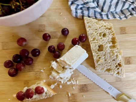 My current go-to snack is so simple. Fresh toasted baguette, a smear of tangy honey goat cheese and sweet sliced red grapes. The perfect way to slice all of this- with my knife set from @Walmart. #WalmartHome #WalmartPartner

#LTKhome #LTKfindsunder50 #LTKparties