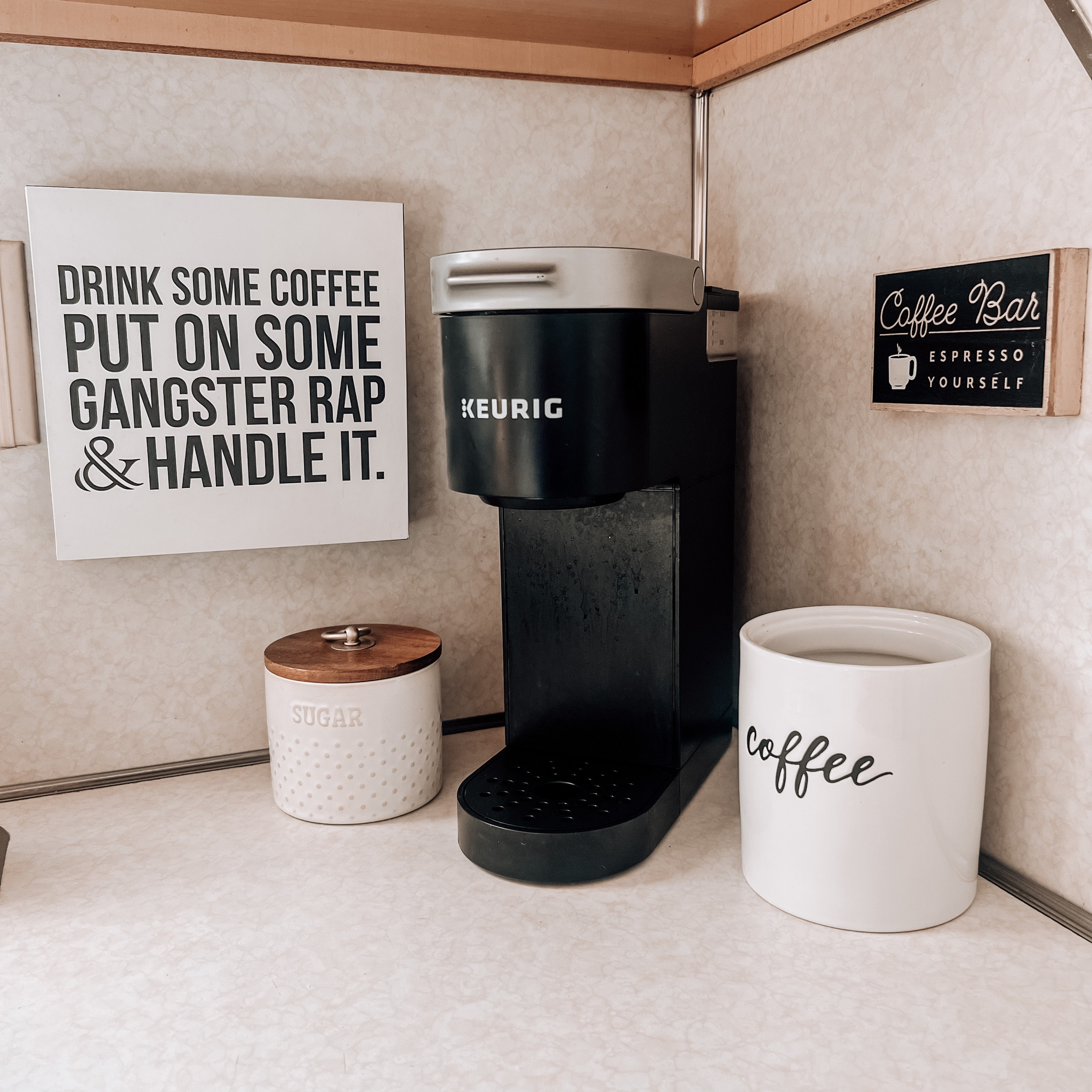 Drink some coffee ☕️ Gangster Rap Handle it! 
This sign is an 8x8 which is linked below! It only sits up typically I have it hanging with command  strips. 

I added some other designs with this same saying and two others than aren’t like this one. There is a 5x5 design of the one in my picture I have added to this post as well! 

#LTKsalealert #LTKhome #LTKfamily