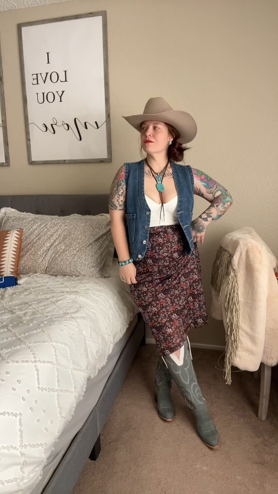 Take a floral skirt but make it western! Nothing like a denim vest and bolo to round out the fit! All pieces are true to size! Plus these vintage Justin boots are so comfy.

#LTKSeasonal #LTKVideo #LTKStyleTip