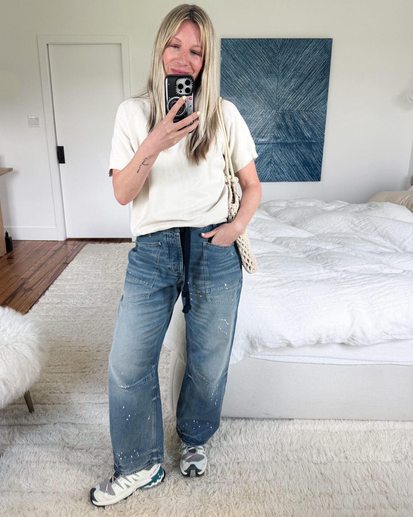 I’ve been intrigued by the Salomon sneaker trend. While the shoes themselves – *technically* hiking shoes – are wildly practical for someone whose main mode of transportation is walking. But I was worried that figuring out how to style Salomon sneakers with jeans would be…tricky. Spoiler: It’s not. 
xo,
S