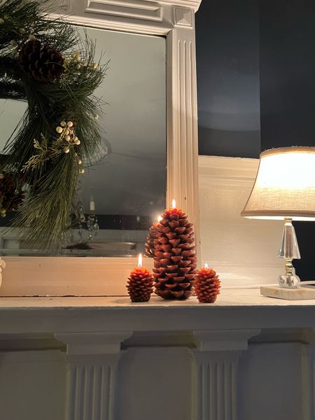 Christmas decor- pinecone candles and faux pinecone wreath 

#LTKhome #LTKSeasonal #LTKHoliday