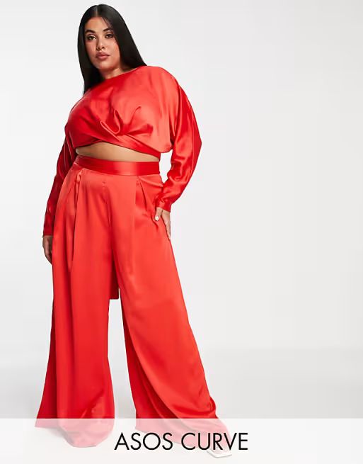 ASOS DESIGN Curve – Langärmliges Oberteil mit Wickeldetail und Bindung vorne und Hose mit weit... | ASOS (Global)