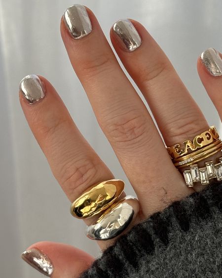 LOVING my silver chrome nails  🪩🪩👽👽
Chrome powder | UV nails | Gel nails at home | Mani ideas | Manicure | Mirror nails | Gold ring | Silver stacking rings | Blanket stitch jumpers 

#LTKparties #LTKeurope #LTKbeauty