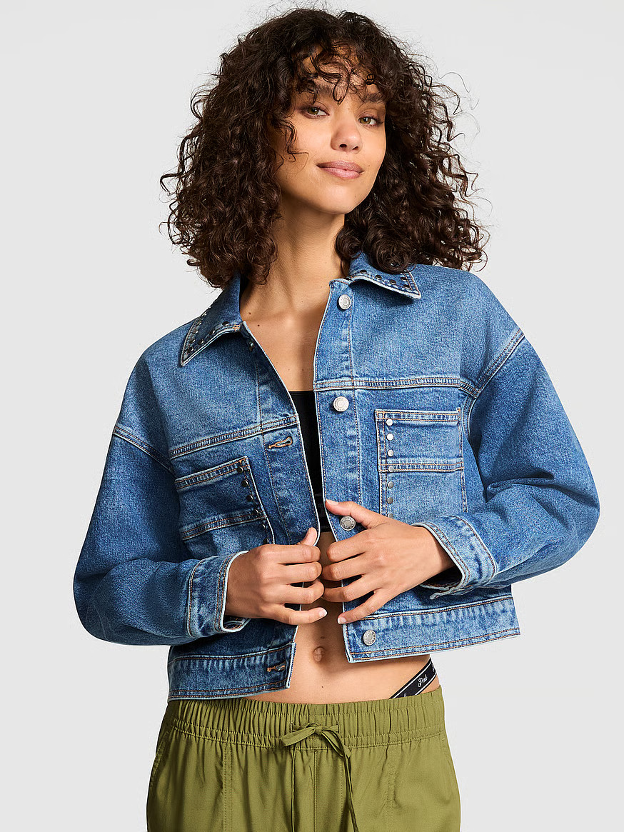 Buy Denim by PINK Cropped Trucker Jacket, Bright Medium Wash Studs - Order Jackets & Outerwear on... | Victoria's Secret (US / CA )