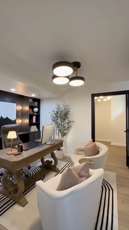 Take a closer look at my hubbys home office! It’s the perfect mix of modern and moody with a gorgeous sliding barn door

#LTKHome #LTKSaleAlert