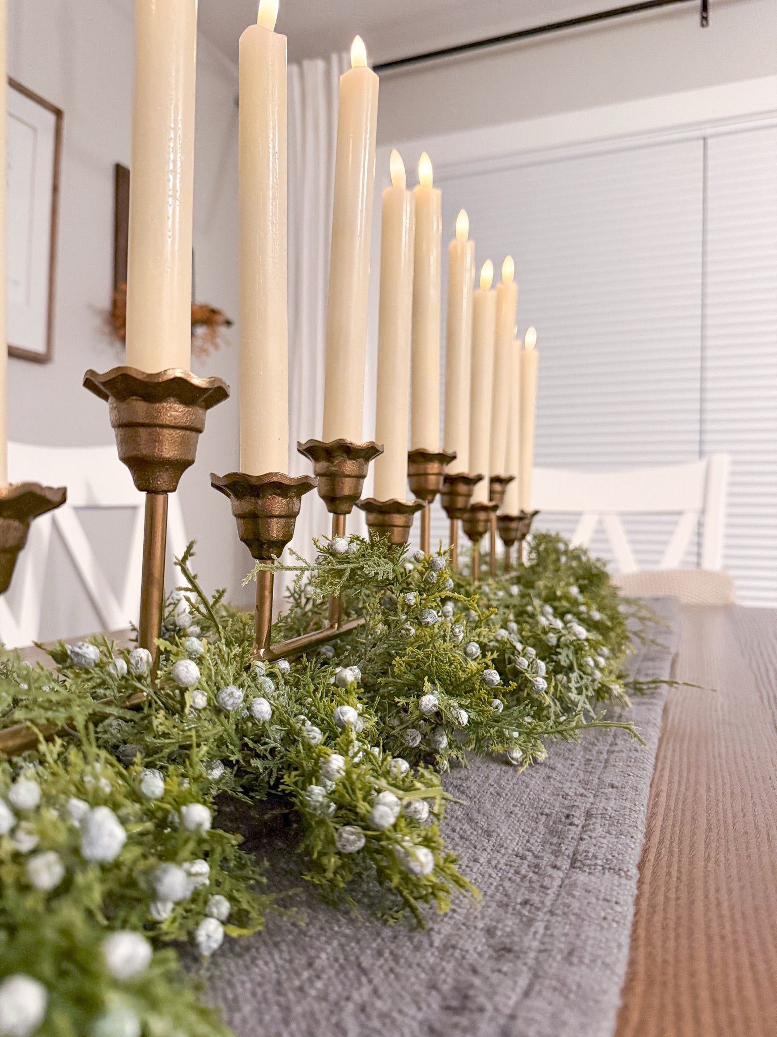 Beautiful afloral juniper garland as a dining room table centerpiece for the holidays!

#LTKSeasonal #LTKHome #LTKHoliday