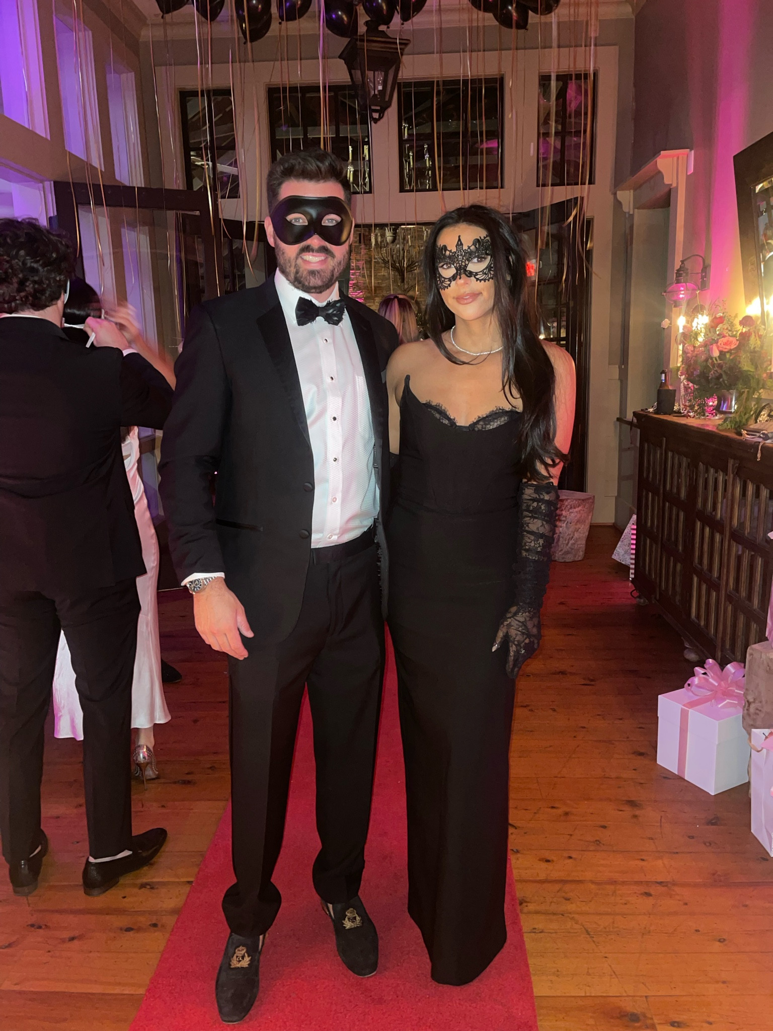 Black tie event masquerade revolve dress black tux 

#LTKParties #LTKHoliday #LTKStyleTip