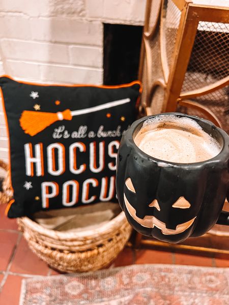 Halloween vibes! This hocus pocus pillow is on sale and my Halloween mug is only $8! Halloween decor, pumpkin mug, world market 

#LTKHalloween #LTKSeasonal #LTKhome