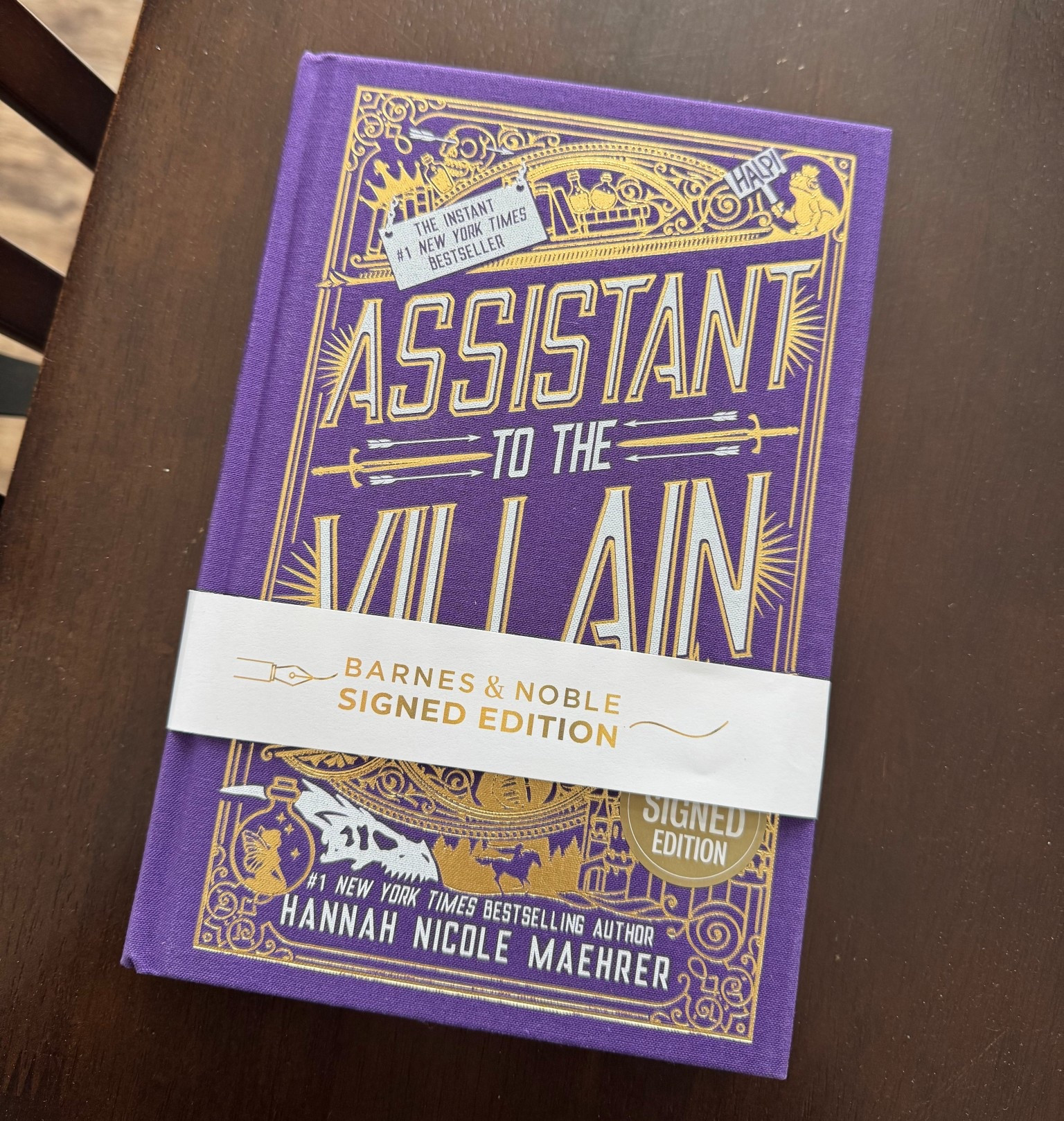 Sold out in stores but STILL AVAILABLE online!! Special edition, hardcover of Assistant to the Villain - signed by author Hannah Nicole Maehrer. It’s a booktok & bookstagram favorite, a five star read for me and happy to finally have it in hardcover! It was a Black Friday in store offering that sold out locally for me before I could grab it.

#LTKFindsUnder100 #LTKGiftGuide #LTKHome