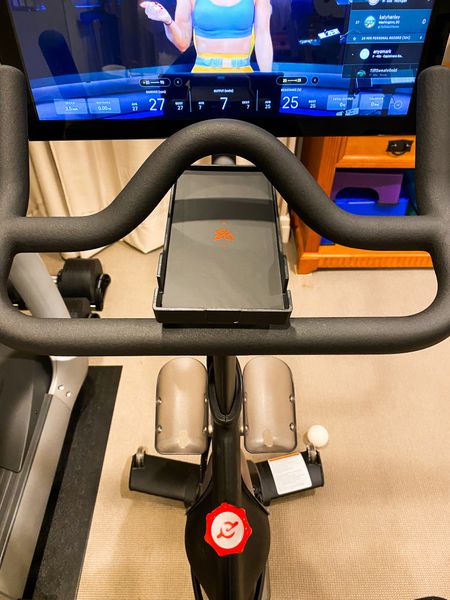The $12 Peloton accessory I didn’t know I needed. This phone & tablet holder is super simple but a total game changer. Needed a place to put my phone to watch the baby monitor and this one is perfect! 

Amazon find. Found it on Amazon. Home gym. Peloton. 

#LTKhome #LTKfitness #LTKsalealert