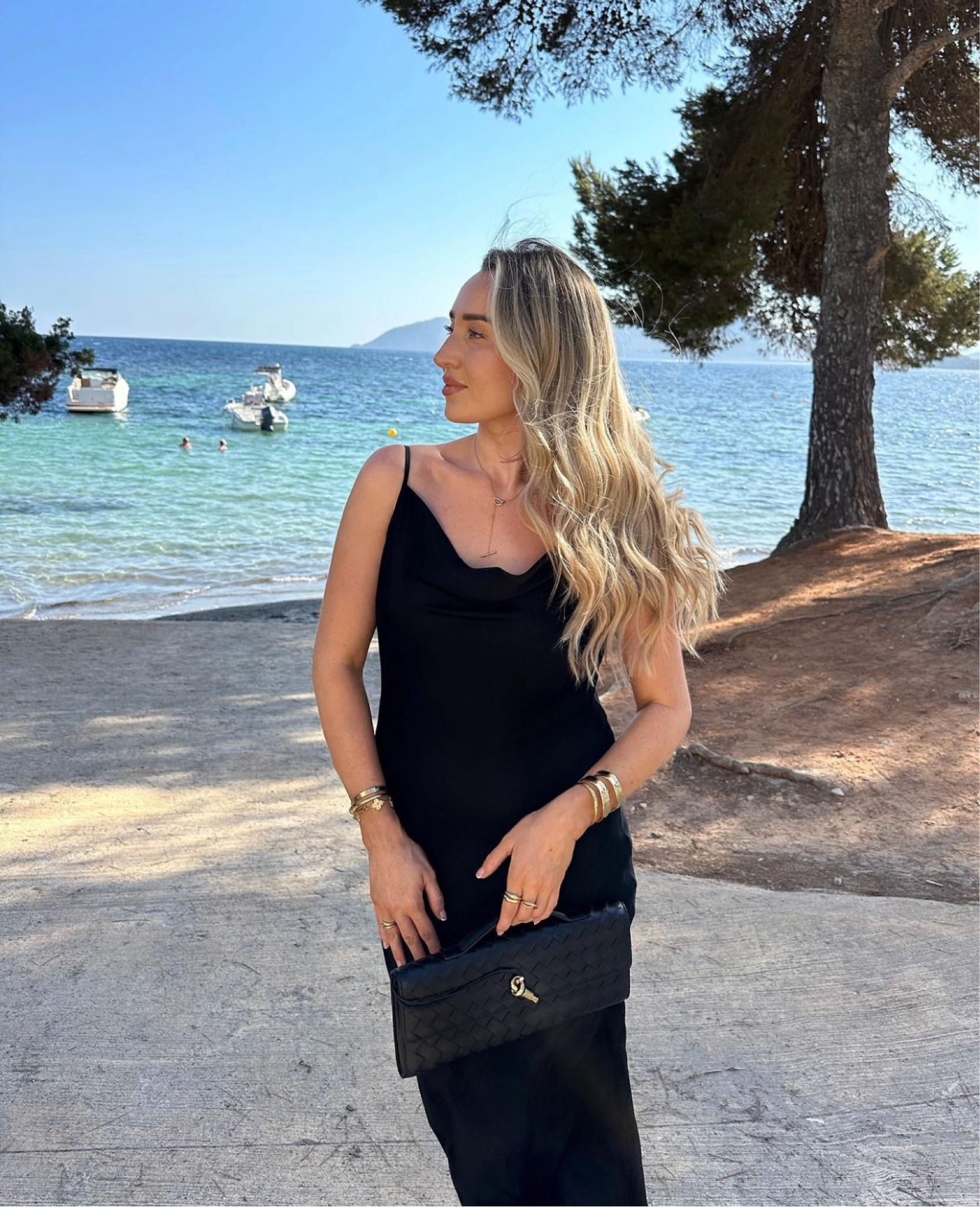 Mermaid siren vibes on the beach 🧜🏻‍♀️ Gorgeous evening wear elegant satin black dress from Reiss, styled with gold Pandora jewellery, gold heels and my Bottega Veneta bag 

#LTKluxury #LTKsummer #LTKeurope