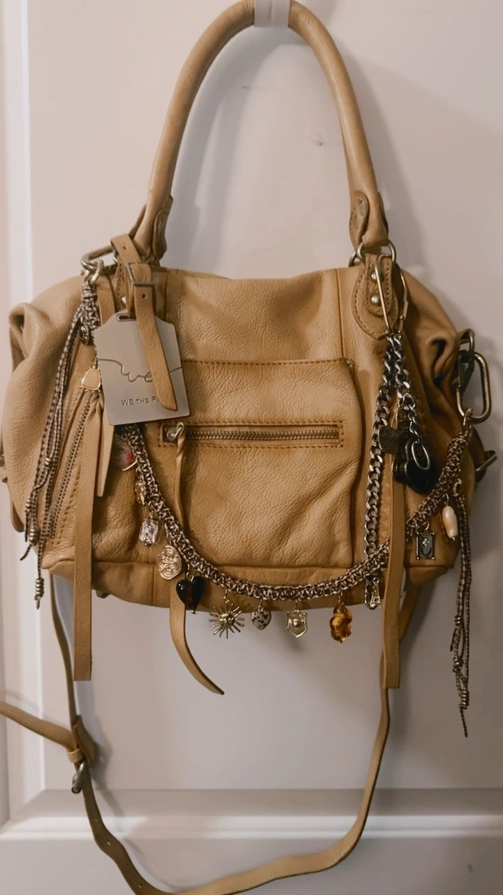I get SO many compliments on this bag!!! The free people baby Emerson bag is perfect I’ll take it in every color. It also comes in a large size that’s a tote and would be a perfect carry on bag!