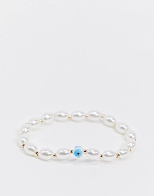 ASOS DESIGN stretch bracelet with faux pearl and eye detail | ASOS US