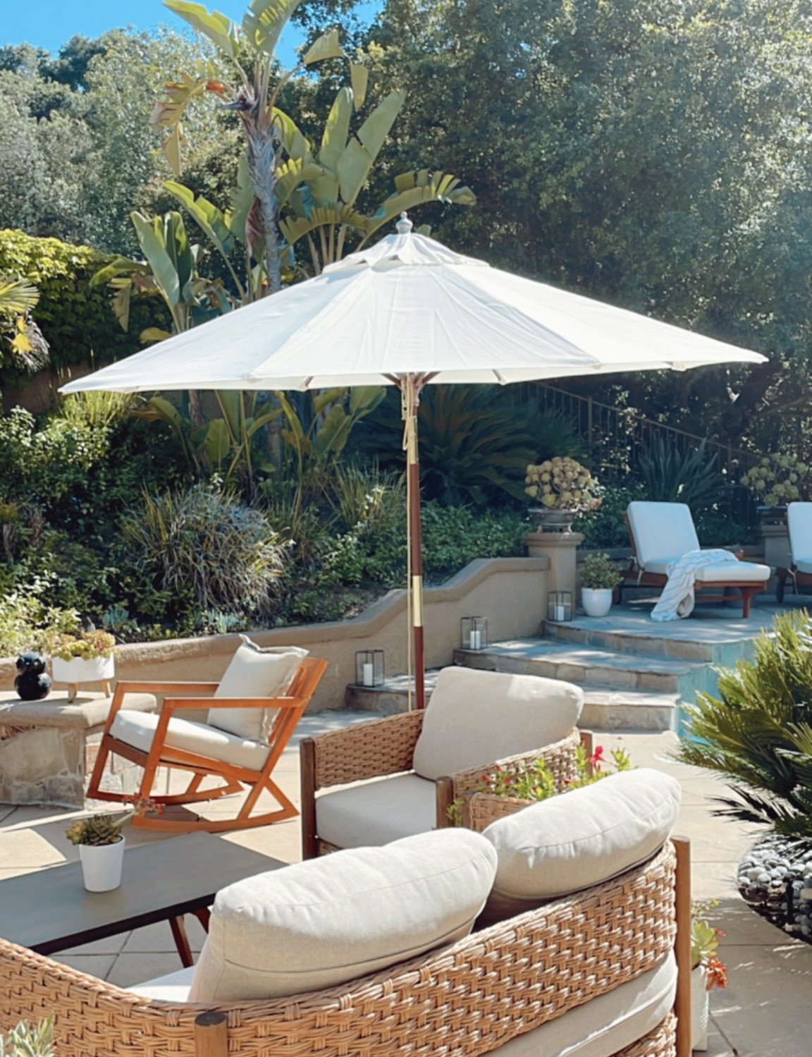 A few of my backyard favorites! #patiodecor #outdoorliving #patioumbrella #chaiselounge 

#LTKhome