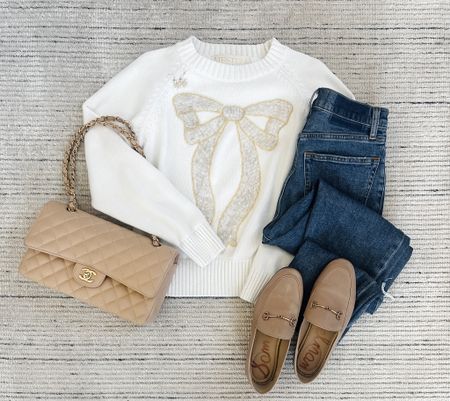 Winter outfit with bow knit sweater paired with mom jeans and loafers for a chic look. Love this for every day winter outfit! 

#LTKSeasonal #LTKstyletip