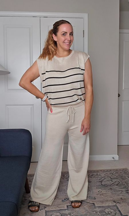 My absolute favorite two-piece knit set. Drawstring waistband pants with pockets and raw hem. Capped sleeved lightweight striped sweater. Wearing a size large. Knit set, Amazon set, sweater pants and tank set, summer style, summer fashion, Amazon Fashion

#LTKstyletip #LTKfindsunder50 #LTKSeasonal