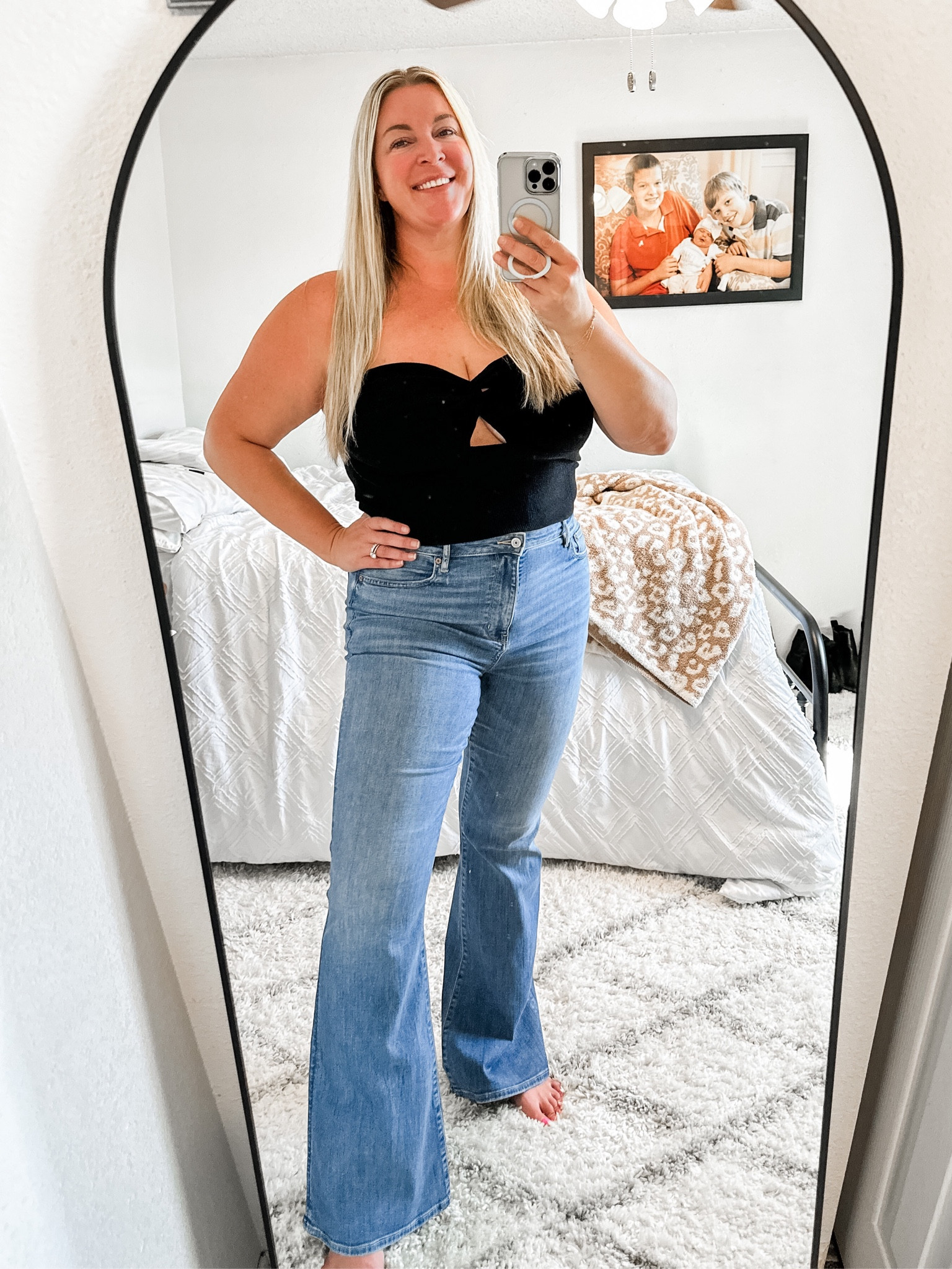 Top is an Amazon find and I love it! I did a size large but there is a good amount of stretch to it. You could size down. 

Jeans are American eagle, I’ve linked similar jeans   

#LTKover40 #LTKxPrime #LTKsalealert