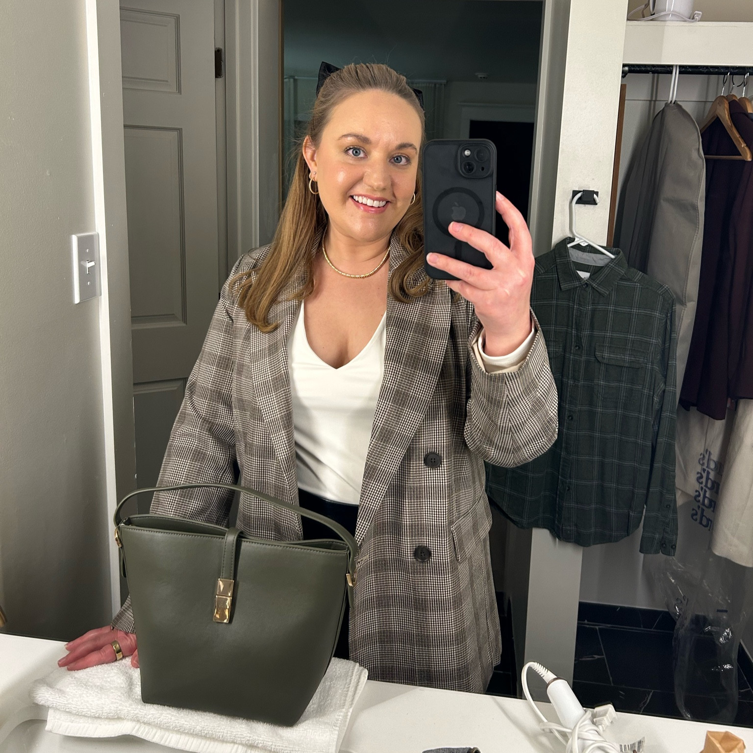 Layering shirt, fitted shirt, long sleeve undershirt, Black tights, tall black boots, leather boots, under the knee boots, knee boots, olive handbag, bucket bag, plaid blazer, hair bow, bow clip, hair clip, black bow clip

#LTKItBag #LTKFindsUnder50 #LTKMidsize