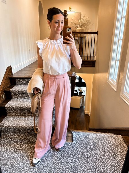 Spring outfit- blush wide leg cargo pants and white ruffle top with sneakers . 

#LTKSeasonal #LTKworkwear #LTKfindsunder50