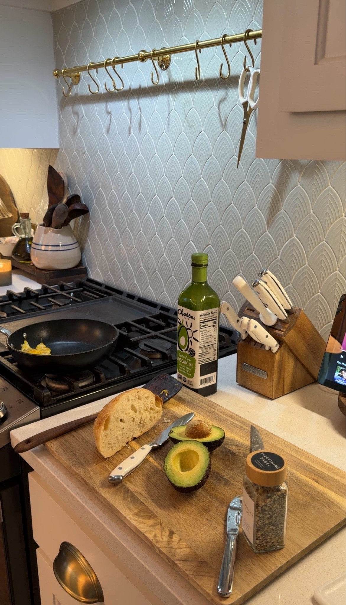 Kitchen decor | Kitchen styling | Traditional kitchen | Transitional kitchen | Cozy kitchen | Kitchen inspiration | Brass pot rack | Pot rack | Brass kitchen decor | Kitchen backsplash | Tile backsplash | Stove styling | Cooking at home | Everyday kitchen | Cutting board | Wood cutting board | Avocado toast | Breakfast at home | Kitchen organization | Kitchen accessories | Warm neutral kitchen | Collected home | Timeless home | Home decor finds | Kitchen finds

#LTKmomlife #LTKstorytime #LTKHome