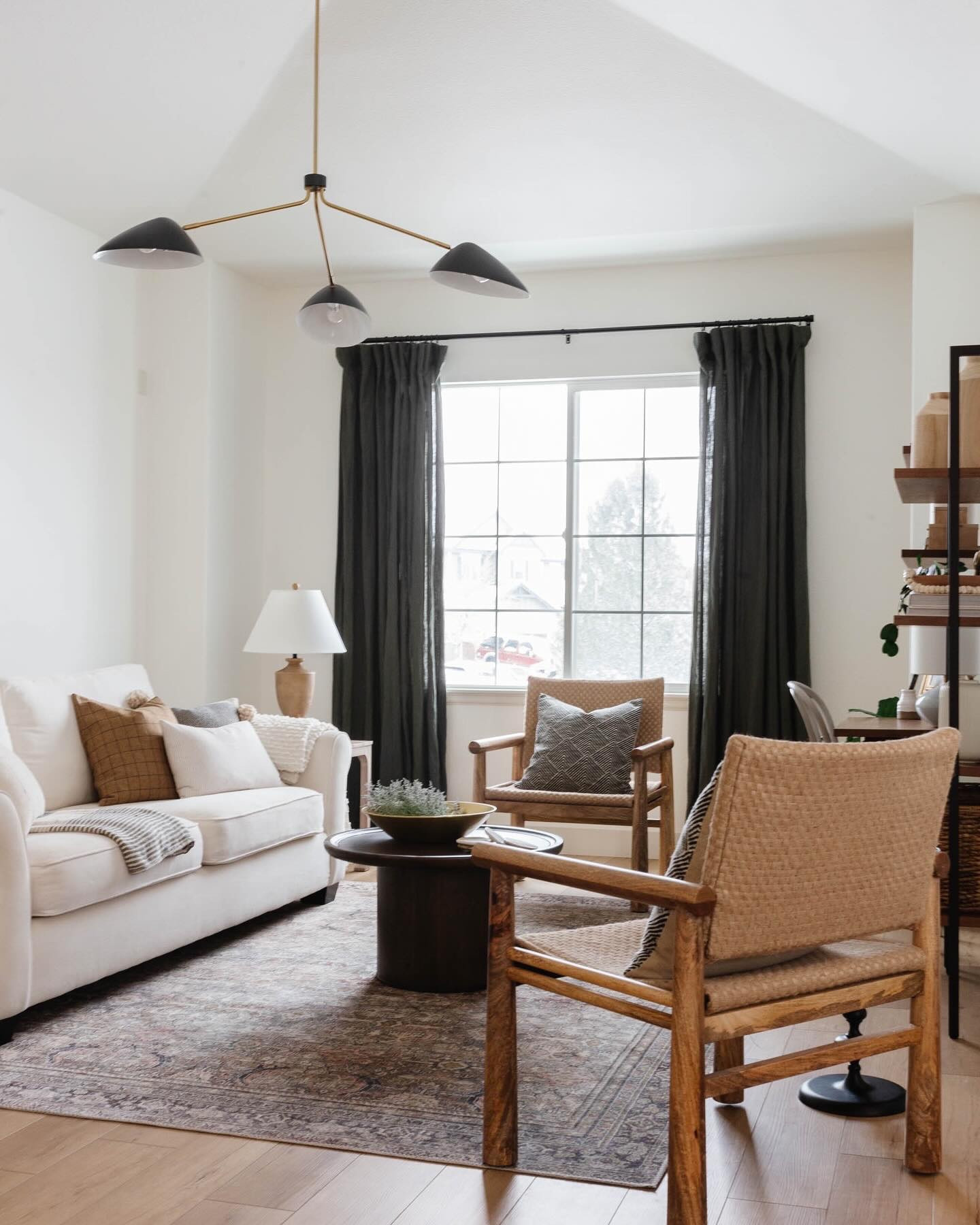 This front living room from #ProjectMeadowbrook had one big request: it needed to be both beautiful and incredibly functional. Our client wanted a space to relax and gather with guests—but also a quiet spot where the kids could do homework or an adult could take a Zoom call in peace. No small task, right?

To make it work, we carved out a workspace by the front window with a slim desk and comfy chair that blend seamlessly into the rest of the room. We layered in high-performance fabrics, a durable rug, and plenty of seating for hosting friends and family. Every detail was chosen to look elevated, but liveable.

If you’re struggling with a space that needs to serve multiple functions, here’s your reminder: you don’t have to sacrifice style for practicality. Think dual-purpose furniture, unexpected layout tweaks, and mixing closed + open storage. A little creativity goes a long way!

Tap the link in bio to revisit the full blog post, see how we brought this room to life, and shop all the details. PLUS don’t forget you can always comment SHOP below to receive a DM with a link to shop this post on my LTK https://liketk.it/5btS3

We hope this helps inspire your next design solution!

Design // @peggyhaddadinteriors
Photography // @karadeyoung

.
.
.
.

#PHIHome #InteriorDesignIdeas #FunctionMeetsStyle #DualPurposeDesign #FamilyFriendlyDecor #ShopTheLook #DesignTips #CollectedHome #DenverInteriorDesign #LTKHome #HomeDesign #StyledSpaces #PeggyHaddadInteriors #PHIHomeDesign #HowIHaven #MyCovetedHome #InMyDomaine #HowYouHome #MyDomaine #HousEenvy #HomeSweetHome #InteriorStyle #InteriorStylingIdeas #InteriorLovers #HomeRenovation #HomeInspiration #HouseGoals #InteriorDesign