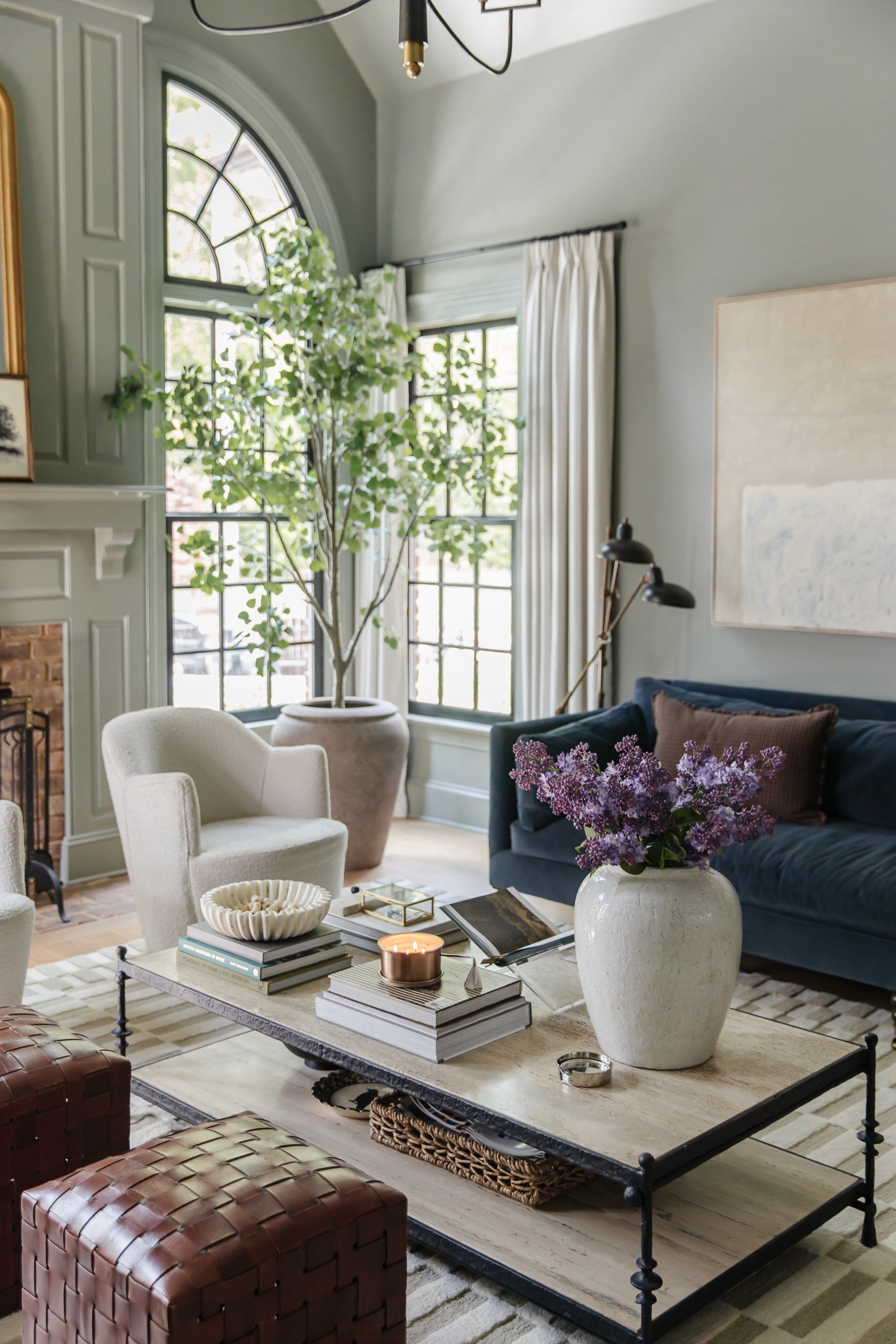 This week in CLJ Summer School we are using our STYLING acronym as a guide for styling your living room. Get all of the necessary ingredients for an inviting and beautiful room at ChrisLovesJulia.com today.

Leather ottoman, Loloi Bradley area rug, boucle swivel chairs, blue velvet sofa, faux tree, urn planter, vase, faux stems, double arm floor lamp, coffee table, coffee table books, marble bowl, book stand

#LTKHome #LTKSummerSales #LTKStyleTip