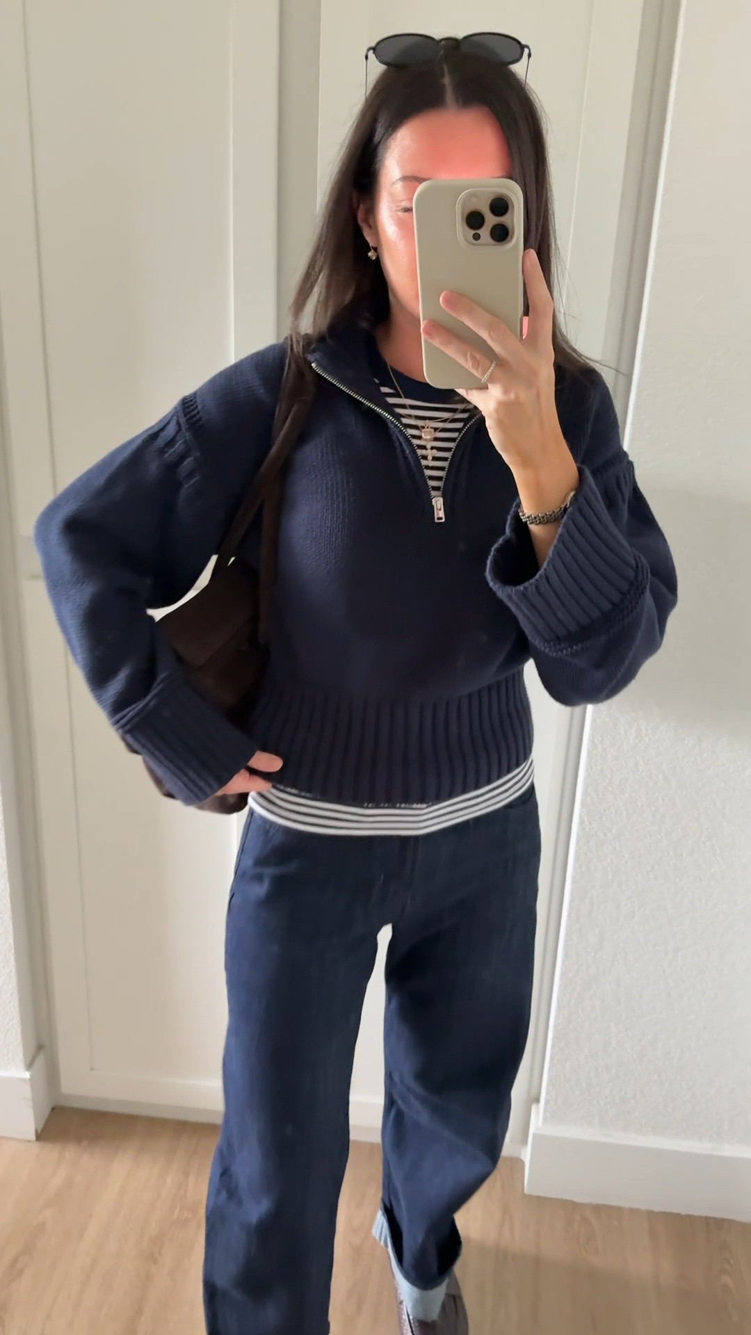 I am 5’7” wearing size XS in the top and sweater and my true size 25 in the jeans! Shoes are true to size