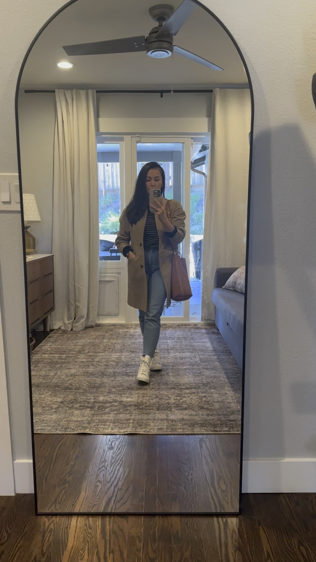 Today’s last minute shopping and errands outfit consists of my fave comfy pieces: striped navy and white sweater, straight cropped jeans, tan coat, scalloped high tops, braided camel leather purse and gold earrings and bracelet.

#LTKshoecrush #LTKover40 #LTKstyletip