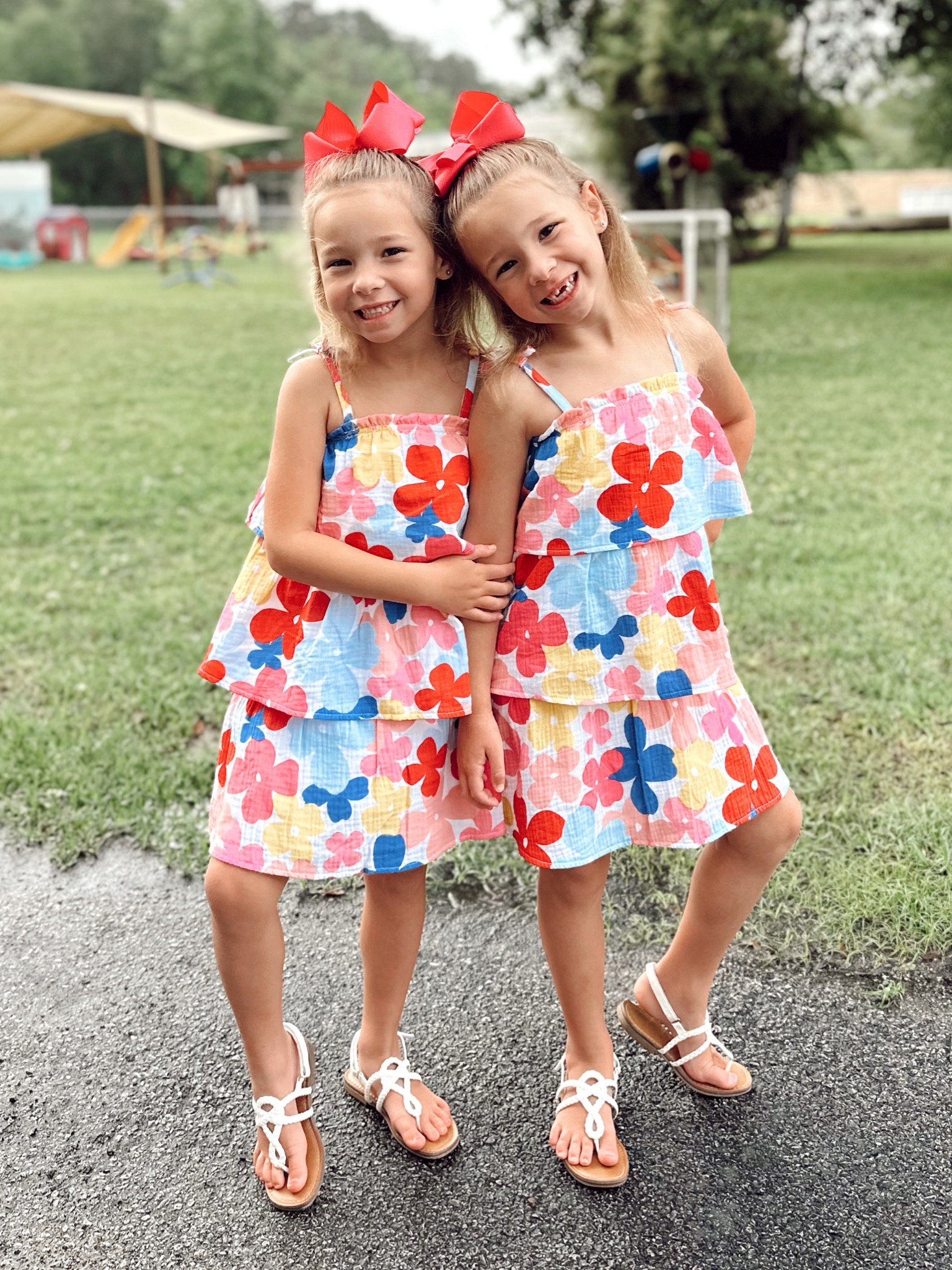 The cutest floral and colorful layered dress from Mud Pie for the twins school pictures!🥹 Sandals are Walmart for the win! 

#LTKunder50 #LTKshoecrush #LTKkids