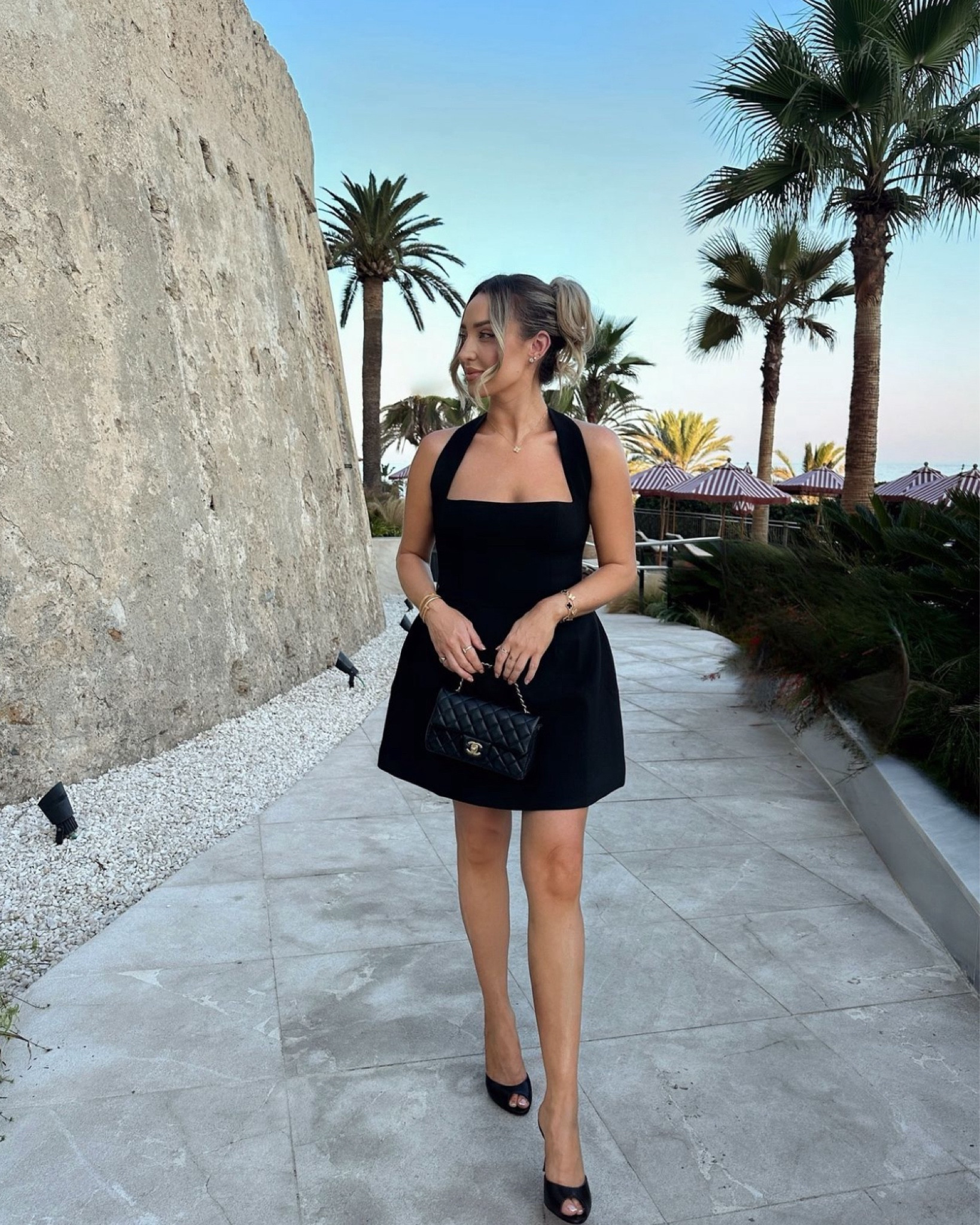 Little black dress of dreams 🖤 holiday evening wear, OddMuse have perfected this halter neck mini dress, styled with my new Christian Louboutin mules and Chanel bag

#LTKsummer #LTKluxury