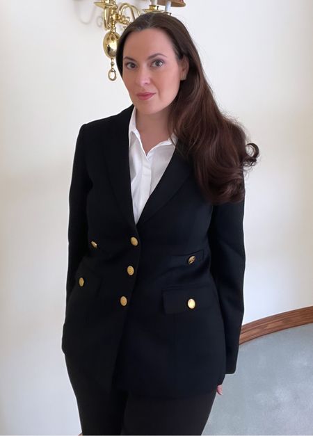 Work outfit of the day - 3-button black blazer embellished with gold colored buttons on the front and cuffs, fitted white poplin button down shirt and black pants  

#LTKover40 #LTKworkwear #LTKsalealert