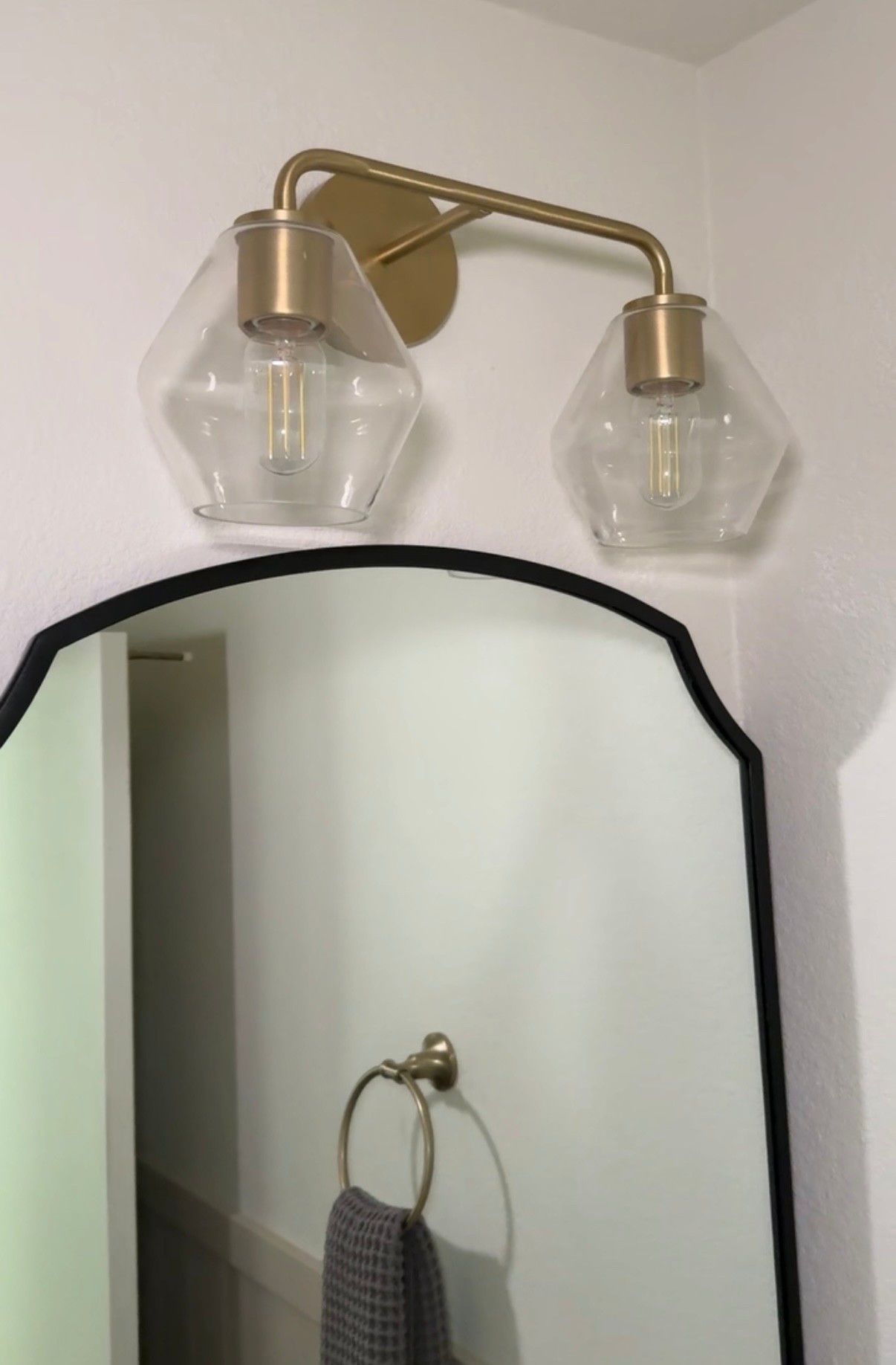 If you have Delta champagne bronze fixtures then you know the struggle to match it! 
I wouldn’t call this a perfect match but given the distance between the faucet and light, it was a win for me!! 

#deltafaucet #deltachampagnebronze #champagnebronze #bathroomremodel #lightfixture #bathroomlight 

#LTKHome
