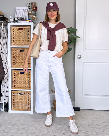 Wide leg jeans outfit!
These jeans are perfect for spring and look so cute with sneakers, flats or heels!
On sale in 🇺🇸 use code TREAT in 🇨🇦 for 10% off! I have washed and worn them and I think I could have gone down one size, the did stretch out a bit. But did not shrink in the length. (I’m 5’ 7 wearing my usual size 27)

I’m wearing my usual size S in the 1/2 zip pullover, it’s so soft and comes in tons of colors (my shade sold out) -  use code CBSTYLEDXSPANX for 10% off.
I sized up to M in the graphic tee for a roomier fit. 
My sneakers are Adidas Gazelles, I always go down 1/2 size in these, 1 1/2 for men’s sizes. (I’m size 7.5, these are men’s 6).
My bag and cap are from Amazon 🇨🇦 which I can’t link but I found the exact same cap and several similar bags (one is the exact same style but different colors)

#LTKstyletip #LTKshoecrush #LTKitbag