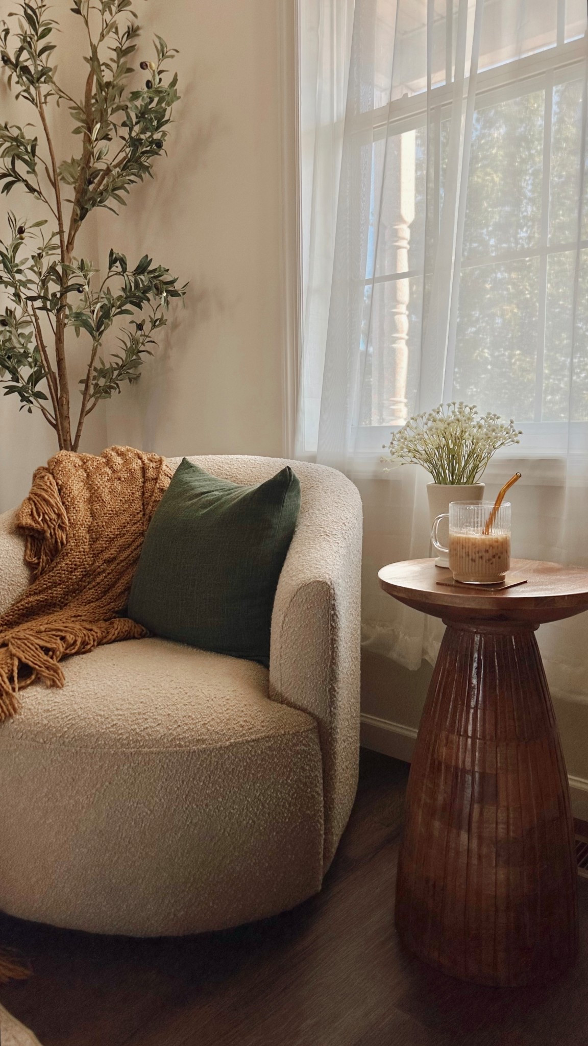 created the coziest little corner with this swivel barrel chair + an olive tree moment 🌿☕️ perfect spot for morning coffee or winding down at night. 

#LTKHome