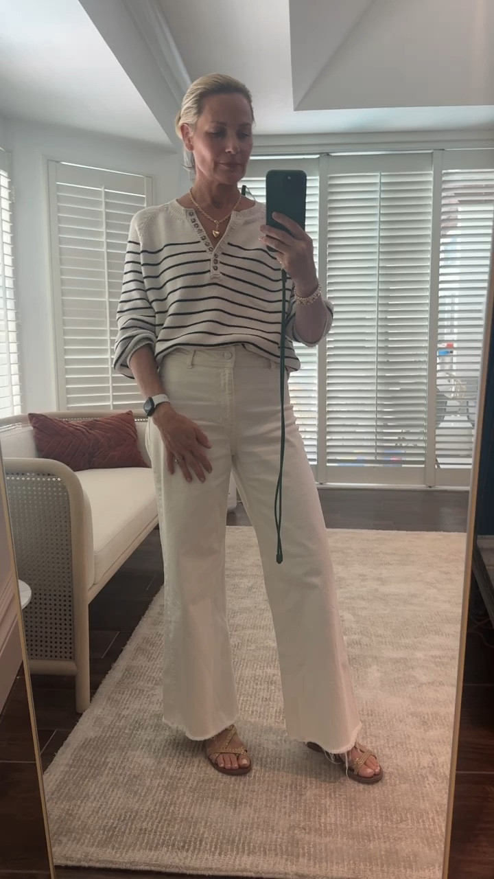 My first #OOTD video 

I had a few people asking where my sweater was from in the shop launch video so I am talking you through the products here and will link everything for you. Most of the things I am wearing are ‘core’ products or best sellers from these brands which means they make them every season because they sell so well. 

The striped jumper is the Leontine knit from Sezane, which I bought a good 2 years ago and still wear all the time. They have made it this season in a bright blue stripe (which sold out straight away) and a camel stripe as well as the navy stripe which I’m wearing, both colours are still available. 

The jeans are one of my secret finds that I probably shouldn’t share but they are too good not to. These are the Katherine wide leg culottes from Mango. (I have already bought 2 of each color in case they sell out or discontinue them so shop away!) I am usually a size US 4 but had to size up to a us 6 in these so go up if you aren’t sure. They are narrow in the hips but have a bit of stretch to them.

The gold braided flats are also from 2 summers ago and are still available at Sezane, but I will also link a similar option at J Crew this summer (the heeled gold version is also nice as is the bright blue heeled version at Sezane).

The jewellery is from NYC based designer Roxanne Assoulin. I am obsessed with puffy heart jewellery this summer and she has the best oversized and mini puffy heart necklaces and matching earrings in gold and silver. I also love her candy coloured necklaces and bracelet stacks. I mixed my beaded bracelet stack in affogato here with the wheat and link chain bracelet set. Again, these are pieces I wear almost every day (just remember to take them off when you shower or go swimming to prolong the life as they are gold plated).

#LTKOver40 #LTKStyleTip #LTKVideo