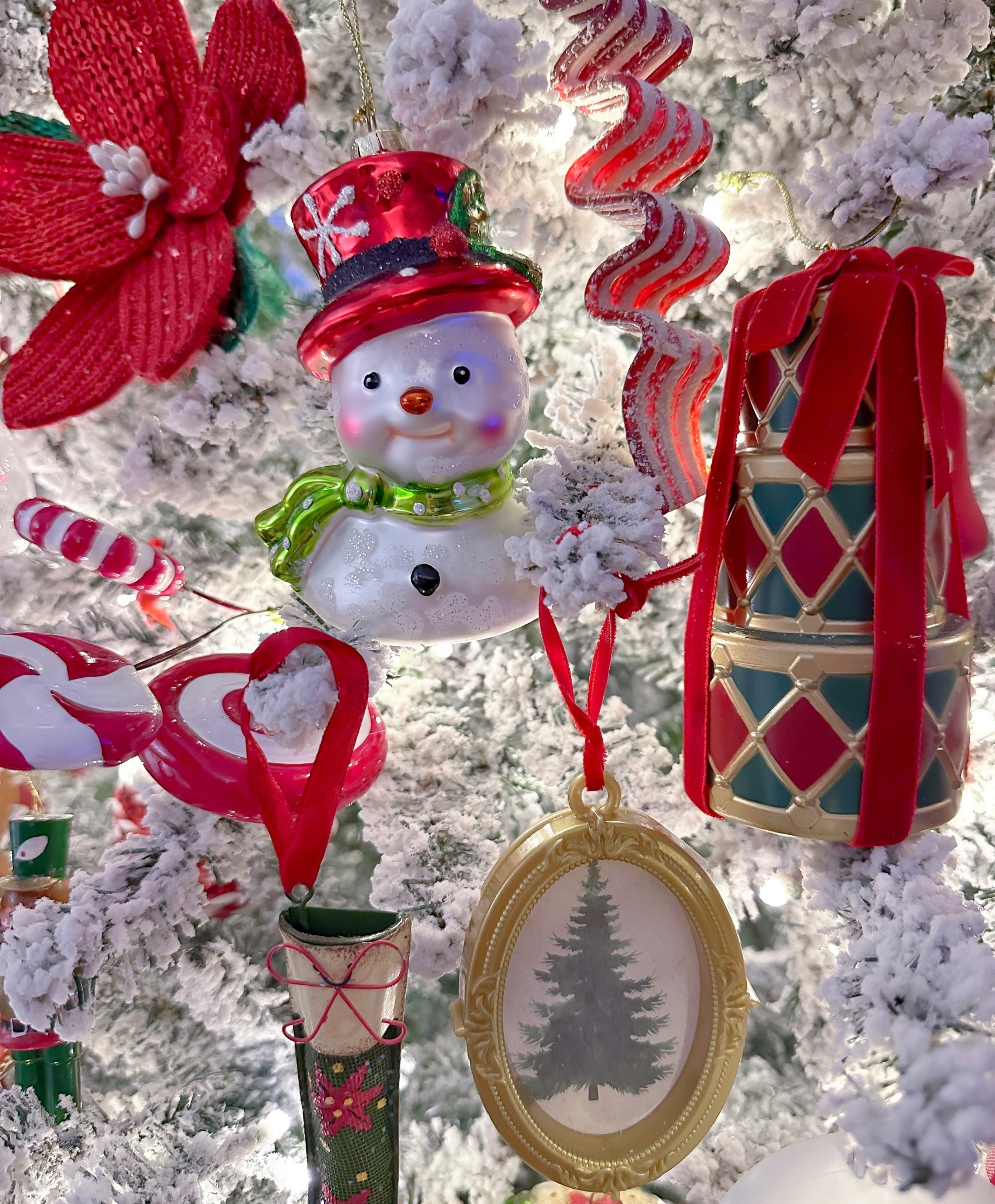 Main Tree is decked! Always a mix of old & new. I love the Bow Drum Set even more! And the sweet $1 Bullsete Vintage Frame Ornament

My Poinsettia is also from Target. The new ones are a little different but I love them just as much! I have tons of these on my tree!  

Christmas Tree. Christmas Ornaments. Christmas Decor. Christmas Home  

#LTKHoliday #LTKHome #LTKSeasonal