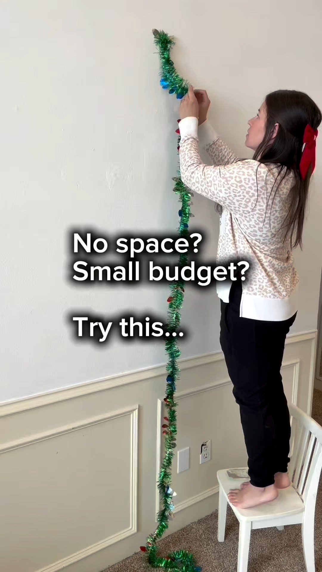 If you’re short on space or working with a tiny budget this year, this wall-mounted Christmas tree is the easiest festive project you can make. 

I did the entire thing with Dollar Tree supplies, and it turned out so pretty. It’s also perfect for playrooms, small apartments, or toddler-proof decorating since nothing is within reach.

Here’s how I made it:

What you need
• Tinsel garland (I used 4–6 strands depending on size)
• Battery operated lights
• Small ornaments and ribbon
• Mini command hooks
• Optional: a bow or tree topper

How to make it
	1.	Map out your tree shape on the wall first. I started with a center point and worked downward.
	2.	Place mini command hooks in a zig-zag pattern to outline the tree. These will anchor your garland and keep the shape clean.
	3.	Hook your tinsel garland onto each command hook, forming the outline of the tree.
	4.	Layer on battery-operated lights. I tucked the battery packs behind the garland for easy hiding and access.
	5.	Add your ornaments, ribbons, and any small accents. Keep them lightweight so they adhere well to the wall.
	6.	Finish with a bow or mini topper at the top.

Such a fun, affordable project and a great solution when you want a magical tree without taking up floor space. I’ll link similar supplies in LTK so you can recreate the look.

Save this idea for your holiday decorating and follow @makingfrugalfun for more budget-friendly Christmas DIYs.

#diy #diymom #christmasdiy #christmasdecor #christmastree #walldecor #dollartree #dollartreediy #dollartreefinds #holidaydecor #budgetdecor #frugalhome #frugalliving

#LTKHome #LTKHoliday #LTKmomlife