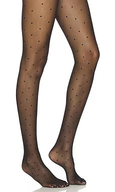 FALKE Dot Tight in Black from Revolve.com | Revolve Clothing (Global)